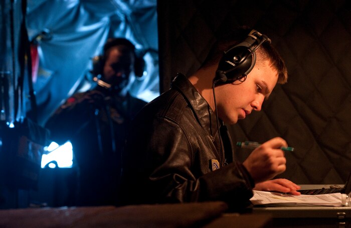 Staff Sgt. Cody Beverly, 350th Air Refueling Squadron boom operator, McConnell AFB, Kan., logs in information, during the Green Flag-West 13-2 exercise Nov. 4, 2012. During exercise execution, Green Flag staff members’ direct, monitor and instruct visiting units in air operations in support of ground forces. (U.S. Air Force photo by Staff Sgt. Christopher Hubenthal)