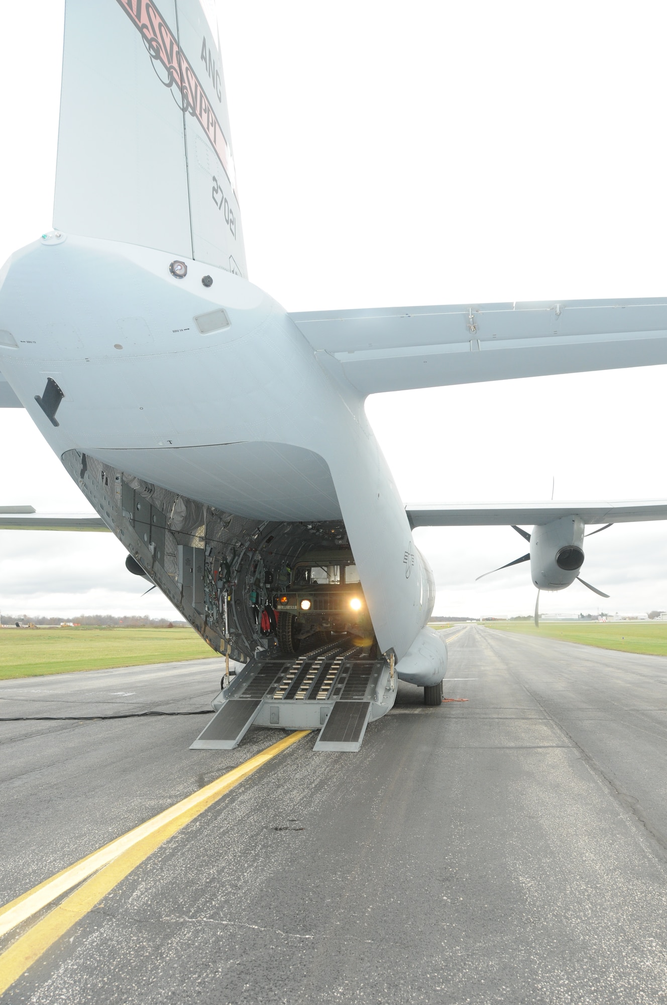 A U. S. Army Humvee from the Ohio National Guard is loaded on board a Mississippi Air National Guard C-27J Spartan military transport aircraft on the Akron-Canton Regional Airport, Green, Ohio, Nov. 3, 2012. The Humvee will be used to support the relief efforts of the New York National Guard in Brooklyn, NY, for the victims of Hurricane Sandy. (U. S. Air Force Photo by Tech. Sgt. Richard L. Smith/Released)