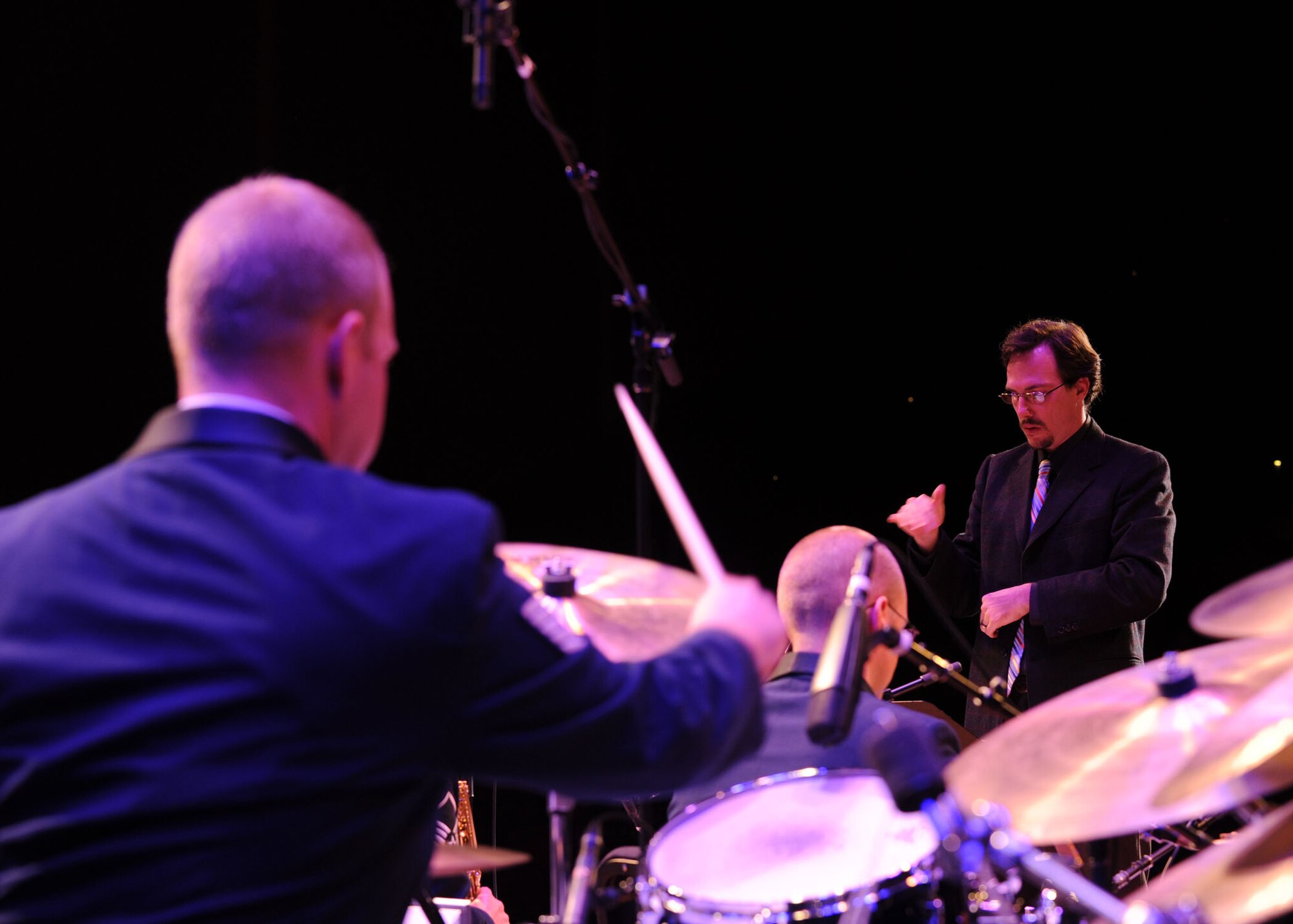 Jeff Fairbanks, Sammy Nestico Composition Competition winner, conducts a musical selection with the U.S. Air Force Band Airmen of Note during a Jazz Heritage Series concert at George Washington University's Lisner Auditorium in Washington, D.C., Oct. 26, 2012. The award winning composer is a well-known freelance trombonist and New York Jazz Academy teacher. (U.S. Air Force photo/ Staff Sgt. Nichelle Anderson)