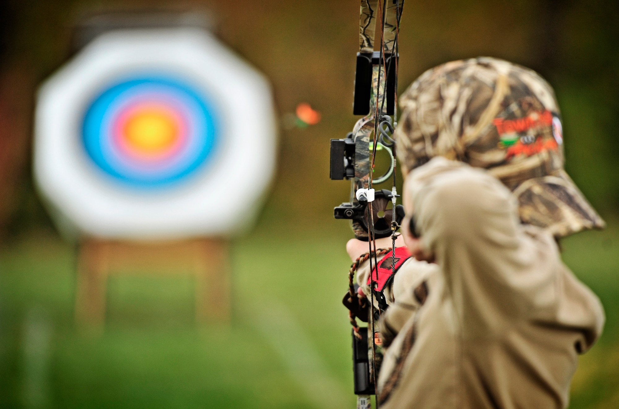 Jared, 13, fires an arrow at his target during an archery tournament at Scott Air Force base Nov. 5. The Scott Outdoor Recreation hosted the event which was opened to all ages and skill levels. Jared was the top finisher for the event. (U.S. Air Force photo/ Staff Sgt. Ryan Crane)