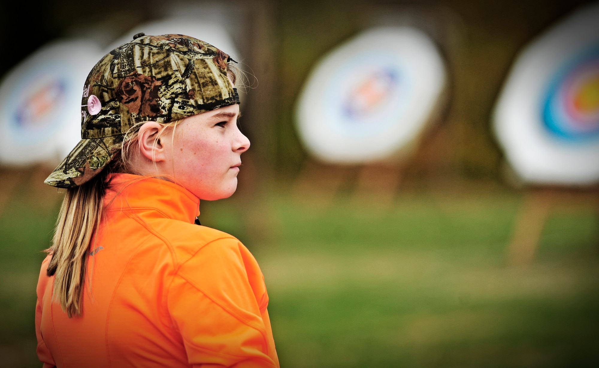 A competitor awaits the results of her first round during an archery tournament at Scott Air Force base Nov. 5. The Scott Outdoor Recreation hosted the event which was opened to all ages and skill levels. The top finisher was Jared Lyles, 13. (U.S. Air Force photo/ Staff Sgt. Ryan Crane)