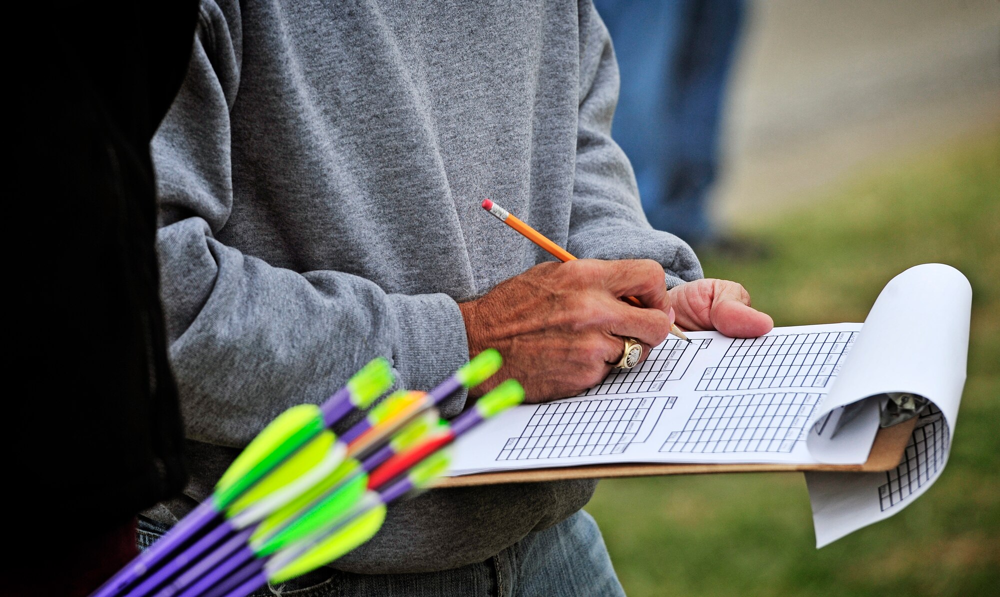 Judges score the first round of an archery tournament at Scott Air Force base Nov. 5. The Scott Outdoor Recreation hosted the event which was opened to all ages and skill levels. The top finisher was Jared Lyles, 13. (U.S. Air Force photo/ Staff Sgt. Ryan Crane)