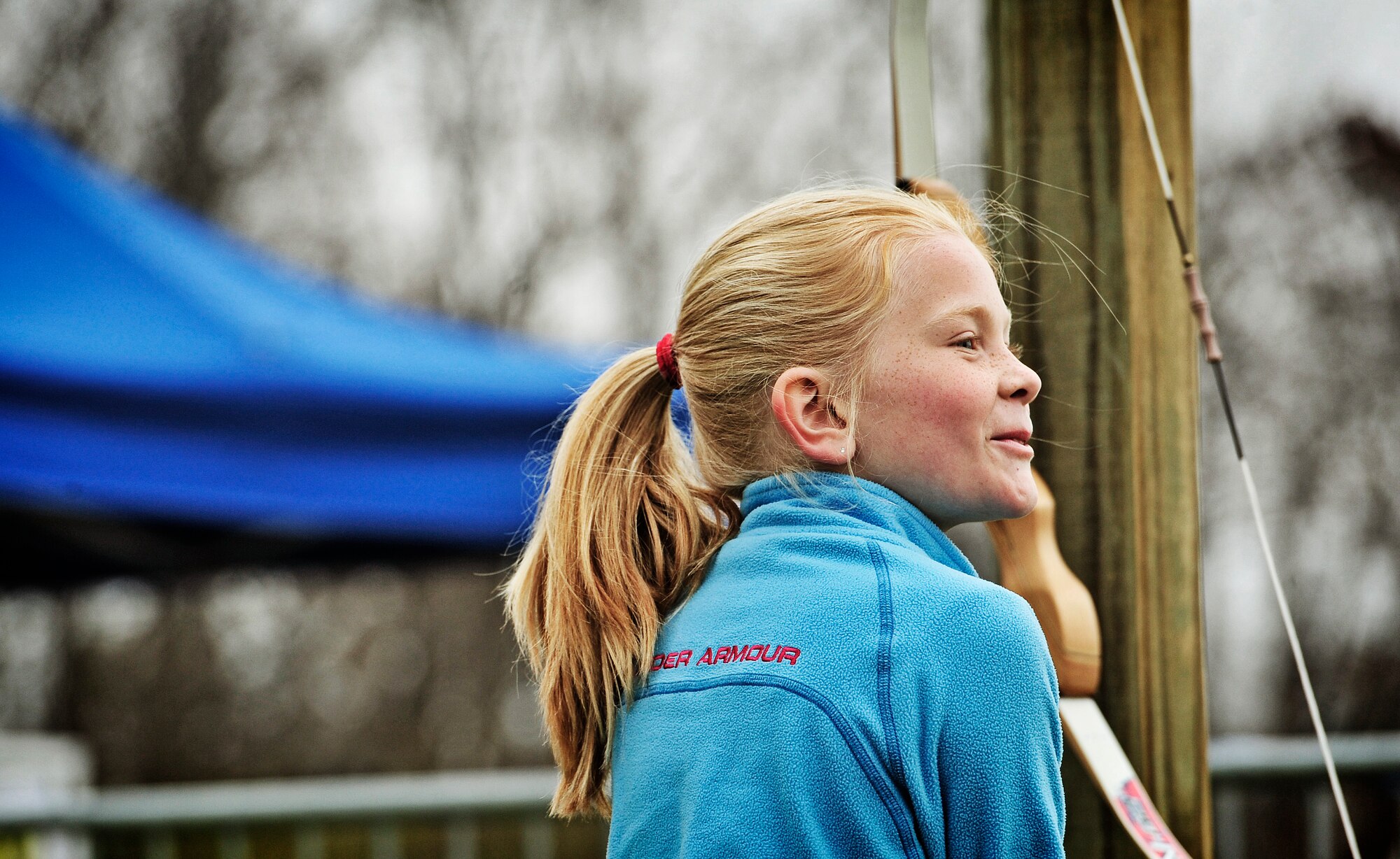 Reagan, 9, smiles after completing her first round during an archery tournament at Scott Air Force base Nov. 5. The Scott Outdoor Recreation hosted the event which was opened to all ages and skill levels. The top finisher was Jared Lyles, 13. (U.S. Air Force photo/ Staff Sgt. Ryan Crane)