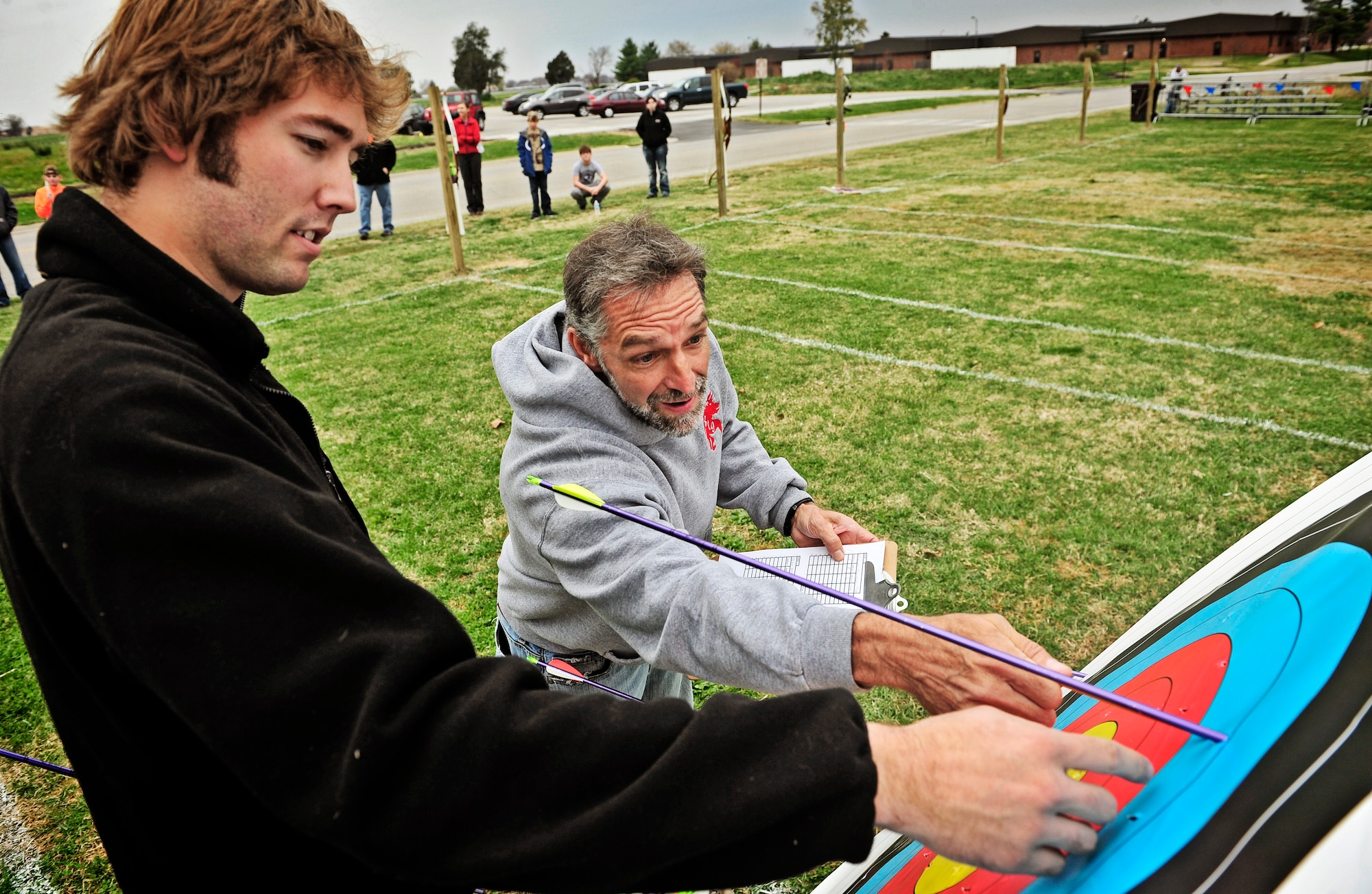 Judges score the first round of an archery tournament at Scott Air Force base Nov. 5. The Scott Outdoor Recreation hosted the event which was opened to all ages and skill levels. The top finisher was Jared Lyles, 13. (U.S. Air Force photo/ Staff Sgt. Ryan Crane)