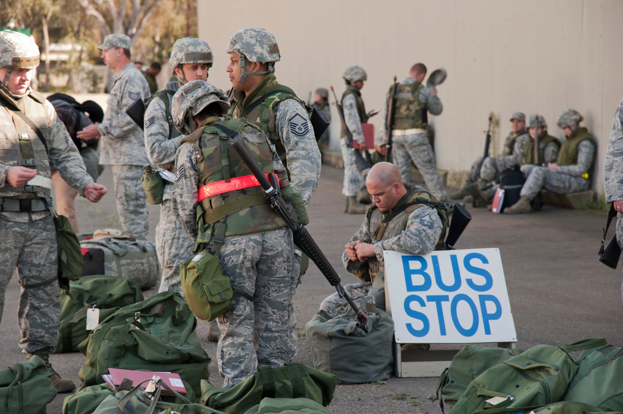 VANDENBERG AIR FORCE BASE, Calif. – Team V Northstar exercise deployers wait to process through a Personnel Deployment Function line at the Installation Deployment Readiness Center here Friday, Nov. 2, 2012. The line is a way for Airmen to ensure that they have everything they need and are cleared to deploy. (U.S. Air Force photo/Senior Airman Lael Huss)