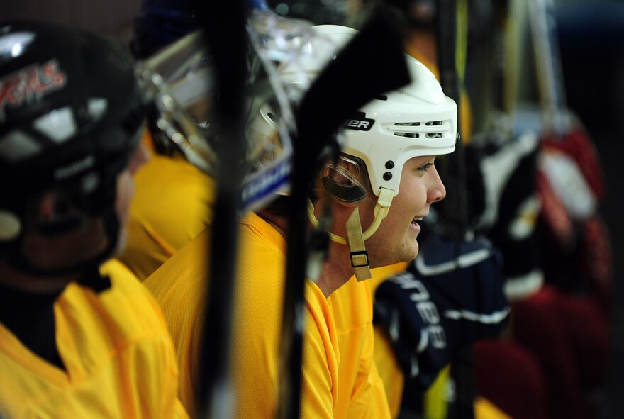 The Offutt Marauders Division 1 team sits on the bench listening to coaches’ tips after a scrimmage with the Division 3 team at the Motto McLean Ice Arena in Omaha, Neb., Oct. 21. The teams will participate in separate divisions during the 10th Annual Armed Services Hockey Association Classic in Las Vegas, Nov. 8 - 11. (U.S. Air Force photo by Josh Plueger/Released)