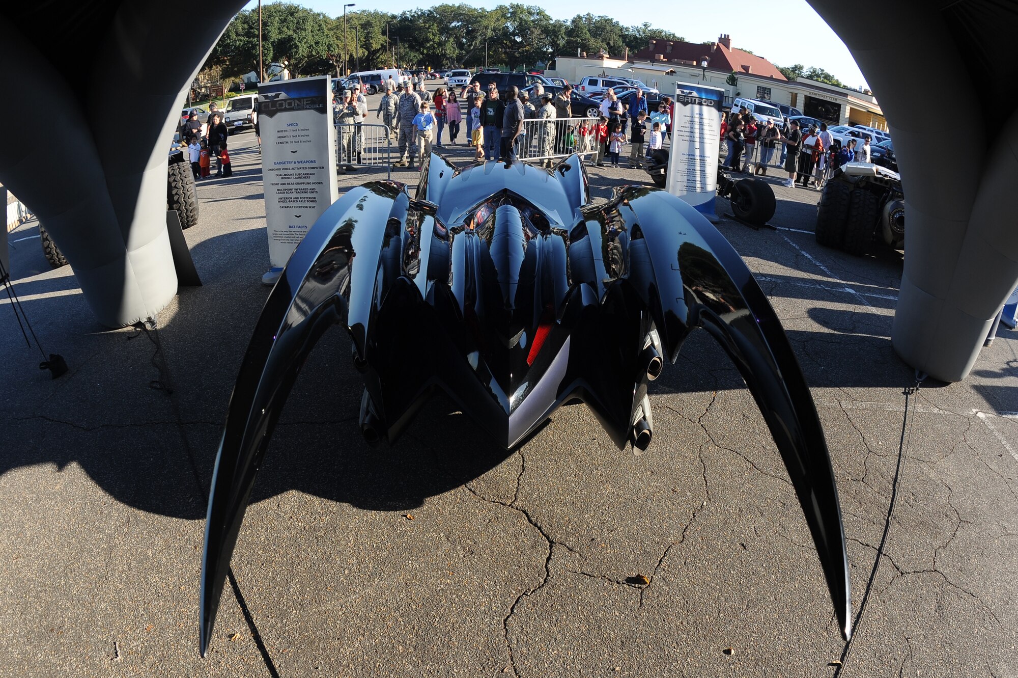 The Batmobile from the 1997 Batman and Robin movie sits on display at the Barksdale Club parking lot on Barksdale Air Force Base, La., Oct. 30. The Batmobile in this movie was the only single-seat convertible. Five other Batmobiles and the Bat-Pod were brought to the base for Team Barksdale to enjoy. (U.S. Air Force photo/Senior Airman Micaiah Anthony)(RELEASED)
