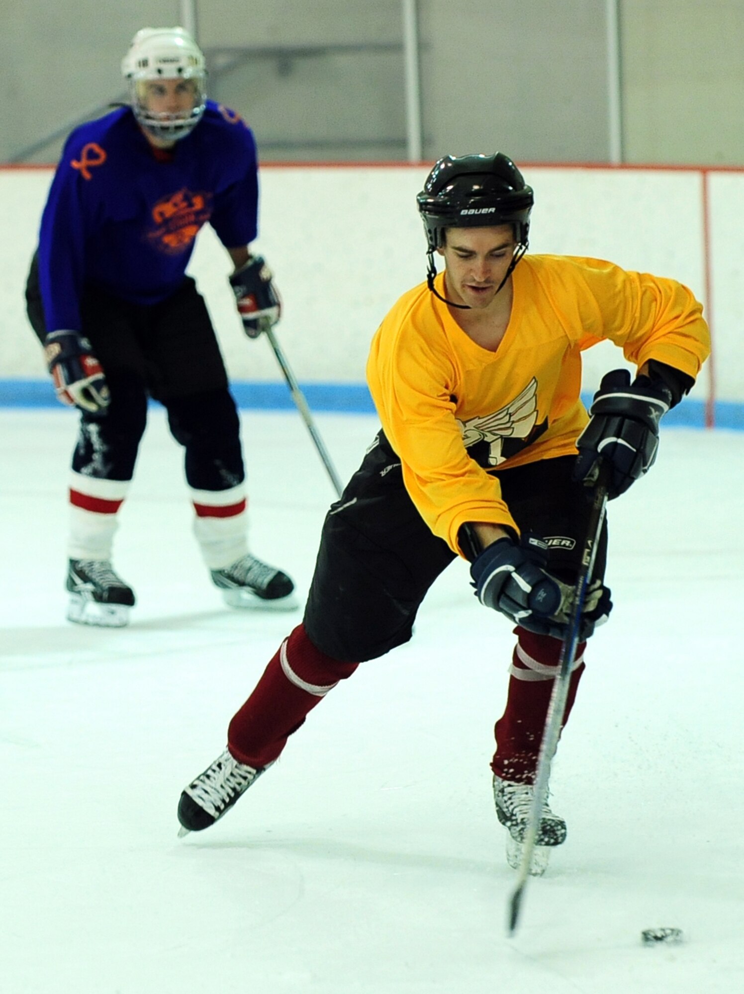 U.S. Air Force Staff Sgt. Joel Therrien, a member of the 55th Security Forces Squadron, prepares to receive the puck during a scrimmage between the Offutt Marauders Division 1 and Division 3 teams at the Motto McLean Ice Arena in Omaha, Neb., Oct. 21. The teams will participate in separate divisions during the 10th Annual Armed Services Hockey Association Classic in Las Vegas, Nov. 8 - 11. (U.S. Air Force photo by Josh Plueger/Released)