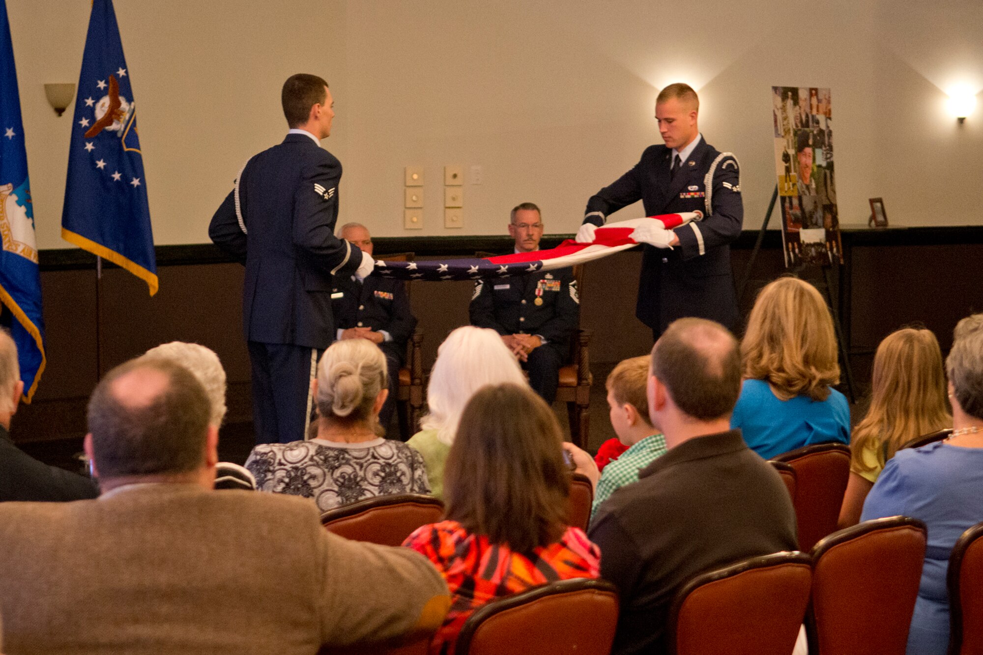 A Flag Folding ceremony is held during the retirement ceremony for Master Sgt. Jim Taliaferro, Nov. 3, 2012, Barksdale Air Force Base, La. Taliaferro is the First Sergeant assigned to the 307th Security Forces Squadron and is retiring after serving 31 years in the military. (U.S. Air Force photo by Master Sgt. Greg Steele/Released)