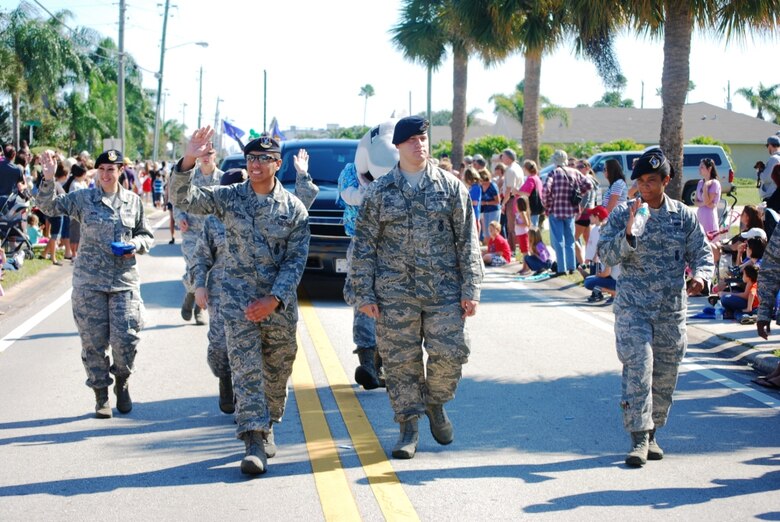 Airmen from the 45th Security Forces Squadron were well received by an enthusiastic crowd during the annual Founder’s Day Parade held in Satellite Beach Saturday morning. 		

