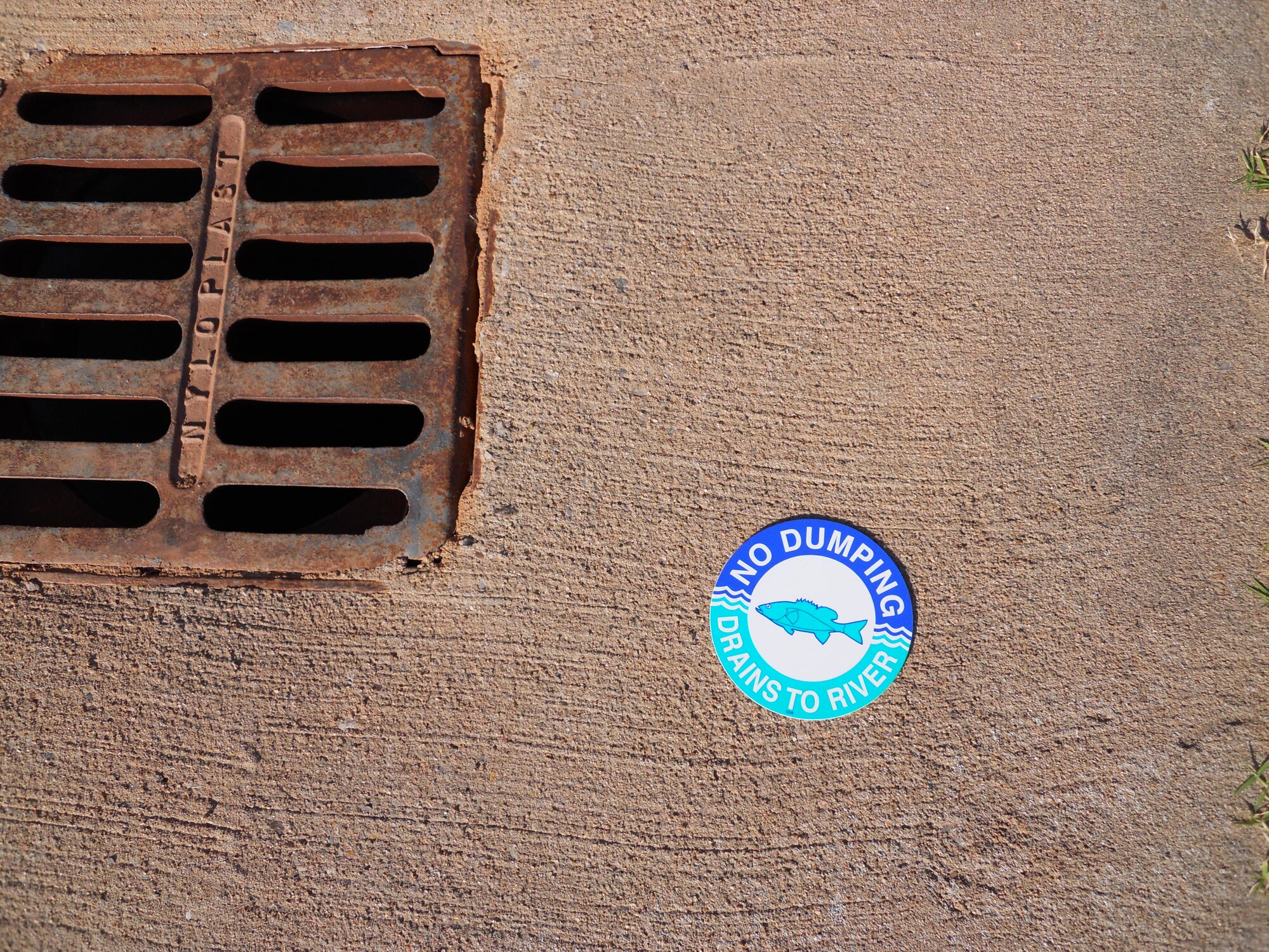 A properly labeled storm drain on Sheppard Air Force Base, Texas.  The base environmental team needs your help to identify storm drains that are not properly labeled. (U.S. Air Force courtesy photo)