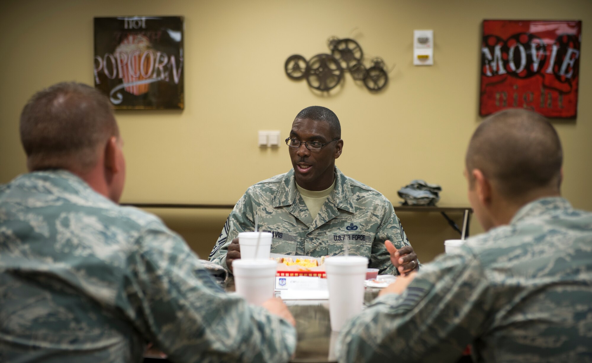 U.S. Air Force Chief Master Sgt. James Davis, 9th Air Force command chief, talks with NCOs at Moody Air Force Base, Ga., Oct. 31, 2012. During their discussion, Davis emphasized the importance of setting the example for other Airmen. (U.S. Air Force photo by Senior Airman Douglas Ellis/Released)