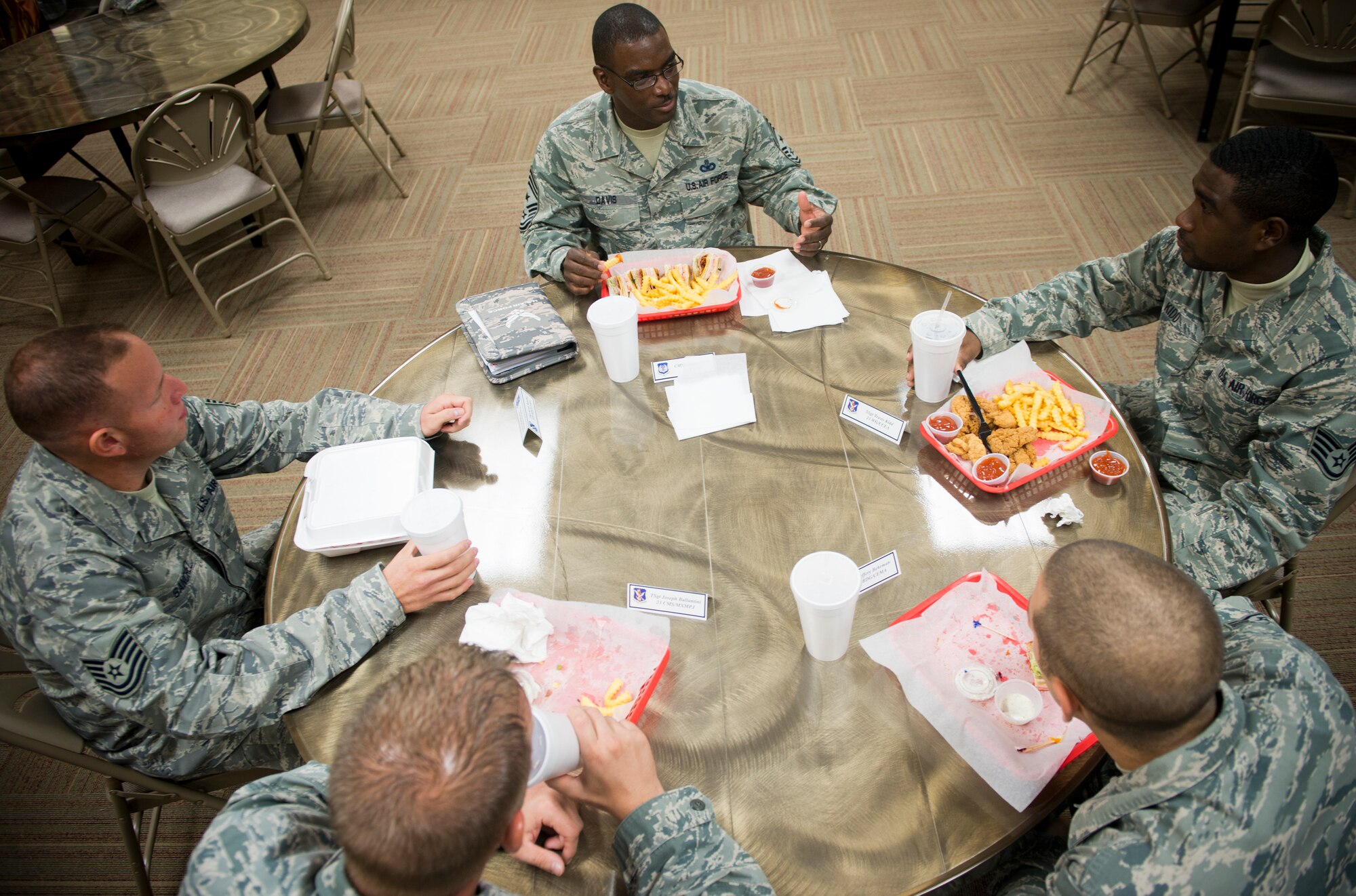 U.S. Air Force Chief Master Sgt. James Davis, 9th Air Force command chief, eats lunch with NCOs at Moody Air Force Base, Ga., Oct. 31, 2012. This was Davis’ first visit to Moody since taking on his new position. (U.S. Air Force photo by Senior Airman Douglas Ellis/Released)