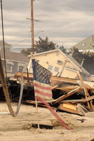 Hurricane Sandy left devastating damage to the coastal regions of New Jersey. Houses slid off their foundations in Orterly Beach, N.J. where emergency responders from Joint Base McGuire-Dix-Lakehurst assisted with recovery operations. (Courtesy photo) 

