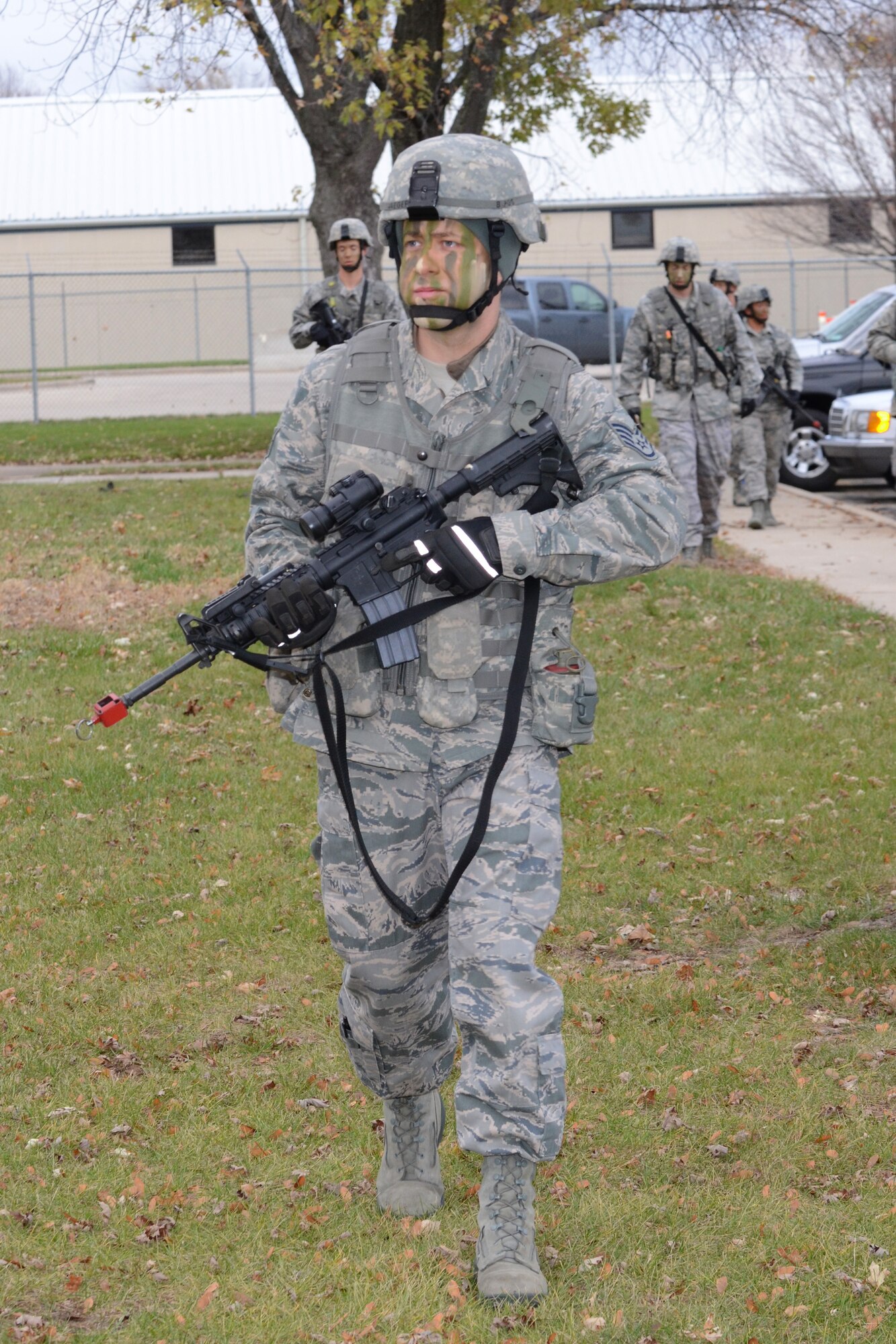 Air National Guard Staff Sgt. Jonathon Jaeger, fire team member for the 115th Security Forces Squadron, leads a security patrol during a training exercise at Truax Field in Madison, Wis. on November 3. Approximately 30 Airmen from the 115th Fighter Wing Security Forces Squadron participated in the training exercise, which focused on improving combat readiness and weapons familiarization..