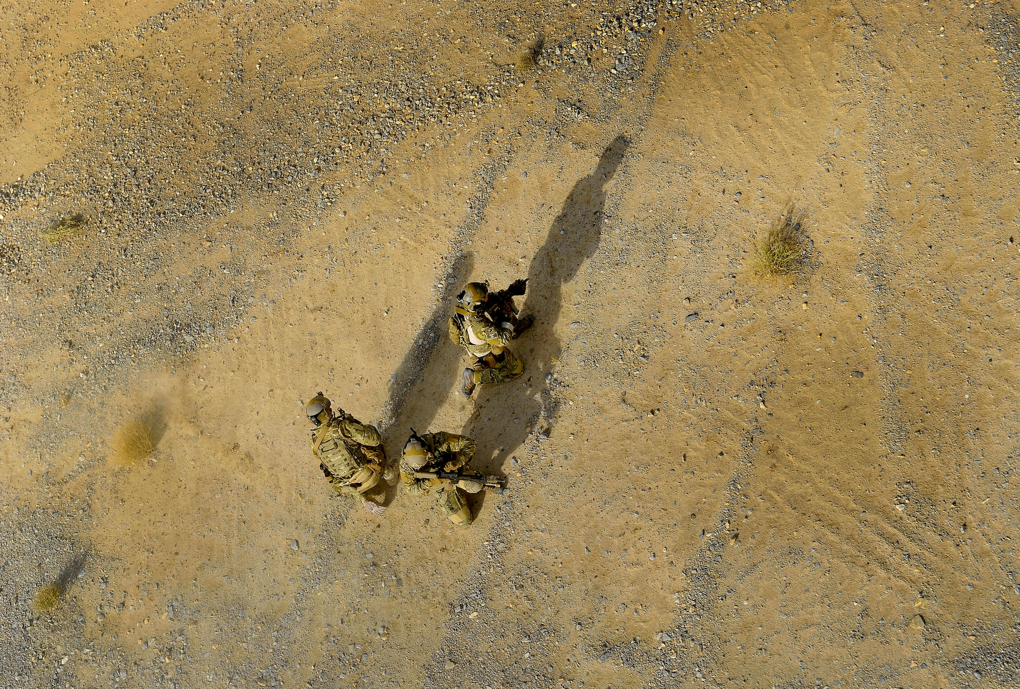 U.S. Air Force pararescuemen assigned to the 46th Expeditionary Rescue Squadron, conduct a training mission near Kandahar Airfield, Afghanistan, Oct. 29, 2012. The pararescuemen work alongside members of the 26th ERQS, who provide the airlift capability with the HH-60G Pave Hawk variant operated by a crew composed of a flight engineer, pilots, and aerial gunners. The two units perform the dangerous mission of providing medical evacuation support for the Kandahar Province in southern Afghanistan. (U.S. Air Force photo/Staff Sgt. Clay Lancaster)