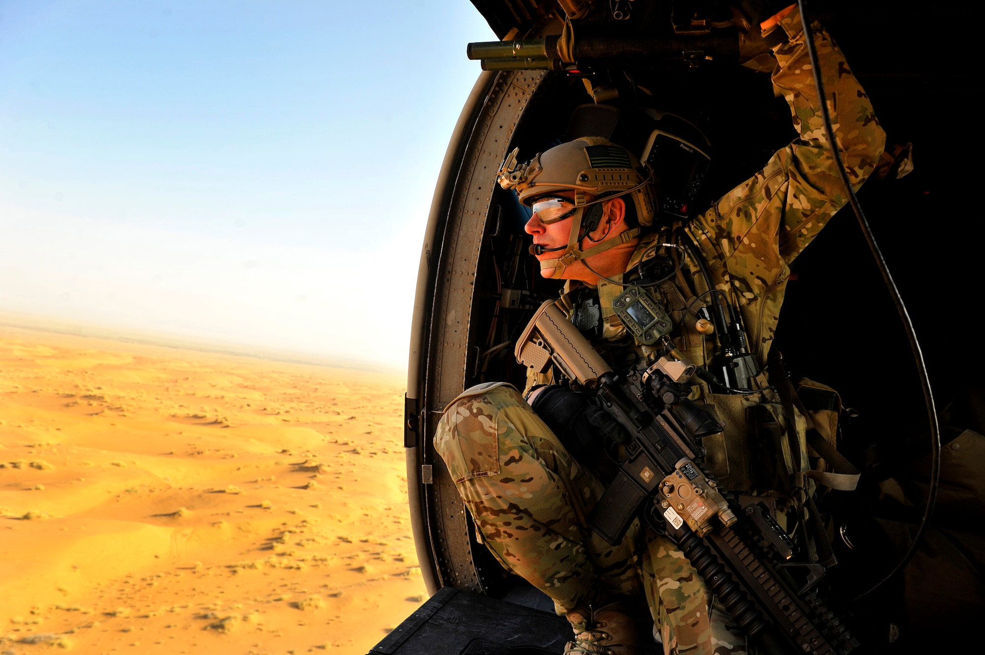 A U.S. Air Force combat rescue officer, 46th Expeditionary Rescue Squadron, conducts a training mission near Kandahar Airfield, Afghanistan, Oct. 29, 2012. Pararescuemen with the 46th ERQS work alongside members of the 26th ERQS, who provide the airlift capability with the HH-60G Pave Hawk variant operated by a crew composed of a flight engineer, pilots, and aerial gunners. (U.S. Air Force photo/Staff Sgt. Clay Lancaster)