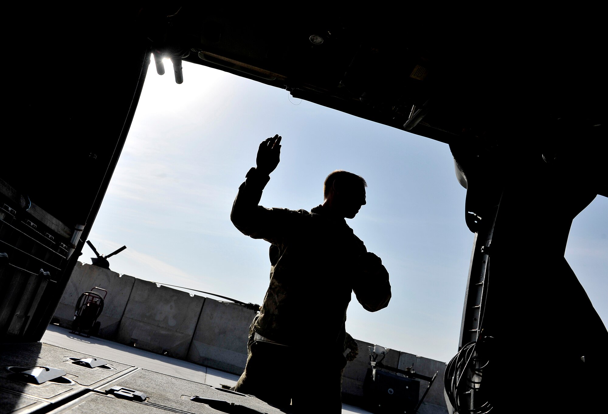 U.S. Air Force Airmen with the 26th Expeditionary Rescue Squadron prepare for a training mission intended to maintain proficiency for future rescue missions at Kandahar Airfield, Afghanistan, Oct. 28, 2012. The 26th ERQS uses an HH-60G variant to conduct rescue missions and perform the medical evacuation support role for surrounding areas in the Kandahar Province of Afghanistan. (U.S. Air Force photo/Staff Sgt. Clay Lancaster)