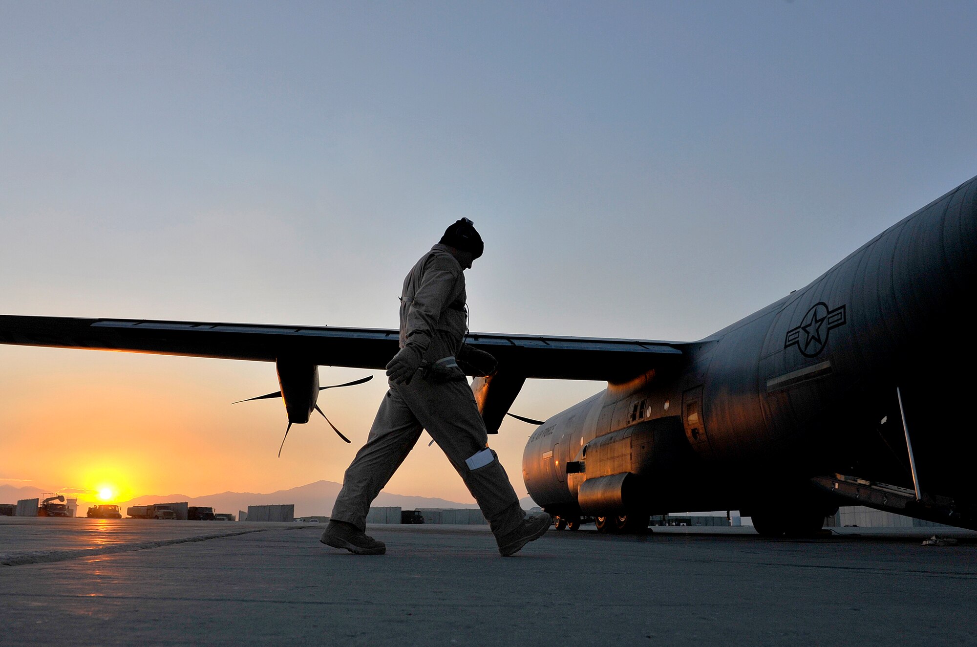 A U.S. Air Force Airman with the 651st Expeditionary Aeromedical Evacuation Squadron helps Contingency Aeromedical Staging Facility personnel carry injured patients luggage during an aeromedical evacuation flight at Bagram Airfield, Afghanistan, Oct. 21, 2012. The aeromedical flights are used to transport injured or recovered patients with the NATO Role 3 hospital and the CASF based at Kandahar Airfield. The 651st CASF staff at Kandahar is 28 members strong and performs tasks ranging from helping medevac patients off of the helicopters they come in on to providing warm beds for their outgoing temporary residents. (U.S. Air Force photo/Staff Sgt. Clay Lancaster)