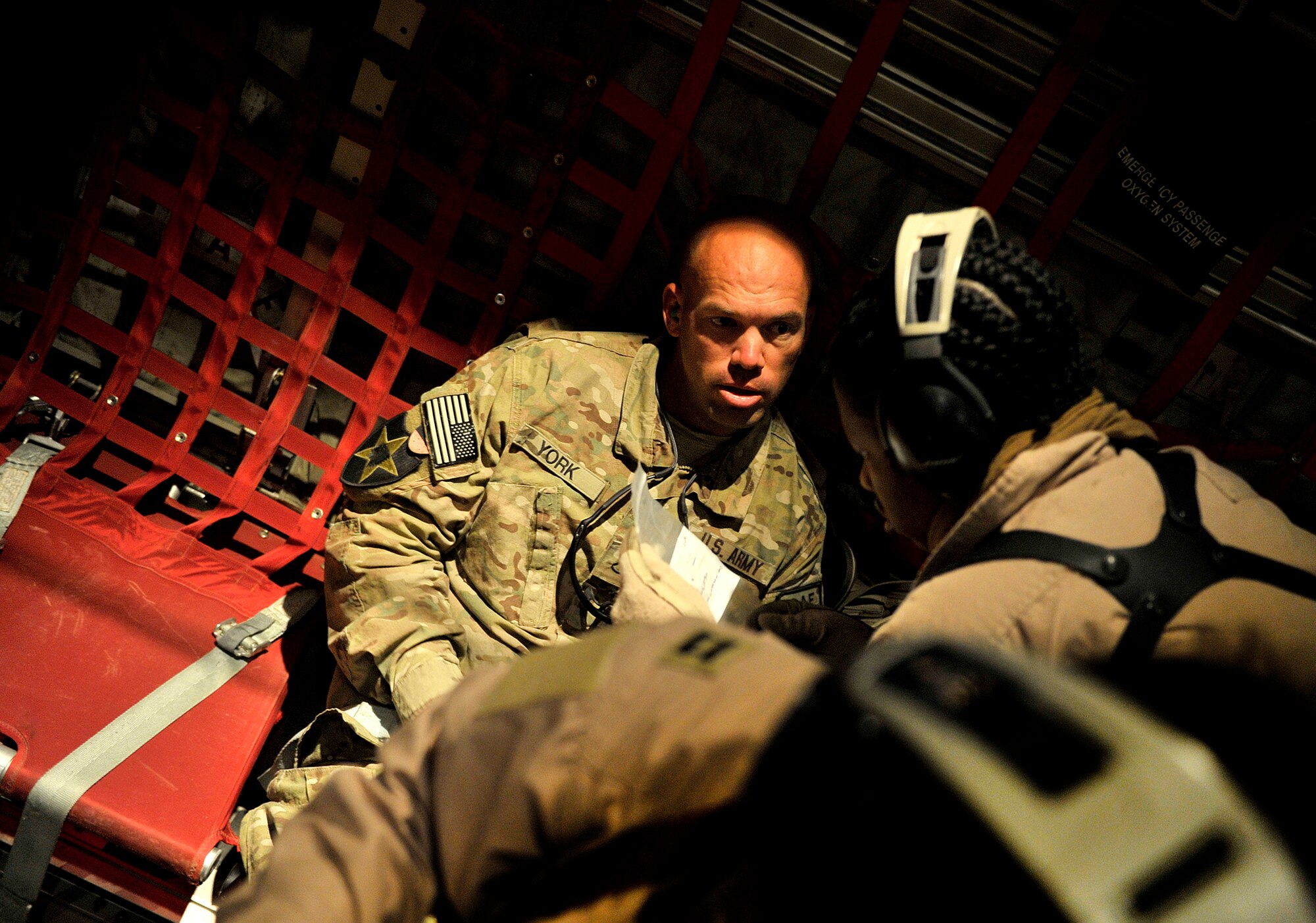 U.S. Air Force aircrew members with the 651st Expeditionary Aeromedical Evacuation  Squadron prepare a C-130 Hercules for an aeromedical evacuation flight at Kandahar Airfield, Afghanistan, Oct. 21, 2012. The aeromedical flights are used to transport injured or recovered patients with the NATO Role 3 hospital and the Contingency Aeromedical Staging Facility. The CASF staff at Kandahar is 28 members strong and performs tasks ranging from helping medevac patients off helicopters to providing warm beds for their outgoing temporary residents. (U.S. Air Force photo/Staff Sgt. Clay Lancaster)