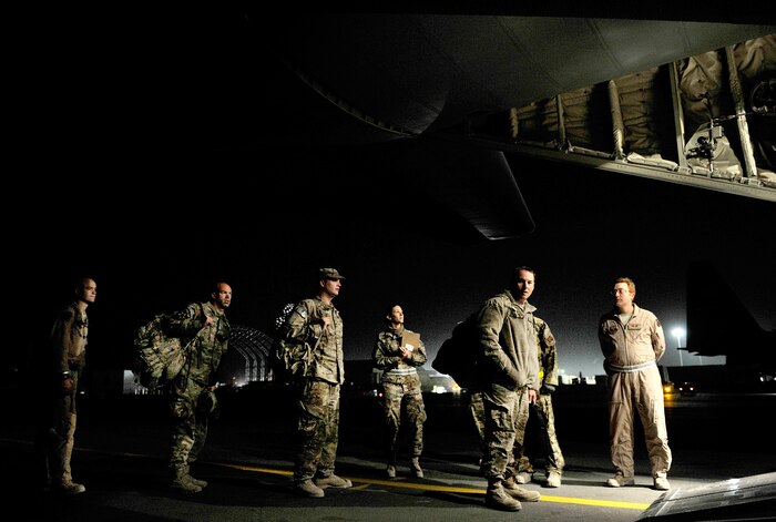 U.S. Air Force aircrew members with the 651st Expeditionary Aeromedical Evacuation  Squadron prepare a C-130 Hercules for an aeromedical evacuation flight at Kandahar Airfield, Afghanistan, Oct. 21, 2012. The aeromedical flights are used to transport injured or recovered patients with the NATO Role 3 hospital and the Contingency Aeromedical Staging Facility. The CASF staff at Kandahar is 28 members strong and performs tasks ranging from helping medevac patients off helicopters to providing warm beds for their outgoing temporary residents. (U.S. Air Force photo/Staff Sgt. Clay Lancaster)