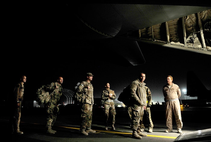 U.S. Air Force aircrew members with the 651st Expeditionary Aeromedical Evacuation  Squadron prepare a C-130 Hercules for an aeromedical evacuation flight at Kandahar Airfield, Afghanistan, Oct. 21, 2012. The aeromedical flights are used to transport injured or recovered patients with the NATO Role 3 hospital and the Contingency Aeromedical Staging Facility. The CASF staff at Kandahar is 28 members strong and performs tasks ranging from helping medevac patients off helicopters to providing warm beds for their outgoing temporary residents. (U.S. Air Force photo/Staff Sgt. Clay Lancaster)