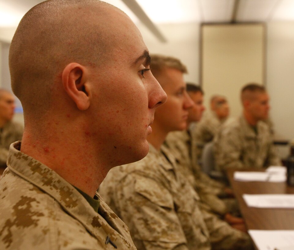 Pfc. Patrick Christensen, a rifleman with Company D, Anti-Terrorism Battalion, 4th Marine Division, attends a briefing about career options available to him after his infantry company is transformed into a military police company in Billings, Mont., Oct. 20, 2012.  Christensen, a Great Falls, Mont., native plans on applying to become a military policeman and continuing to serve in the Reserves.