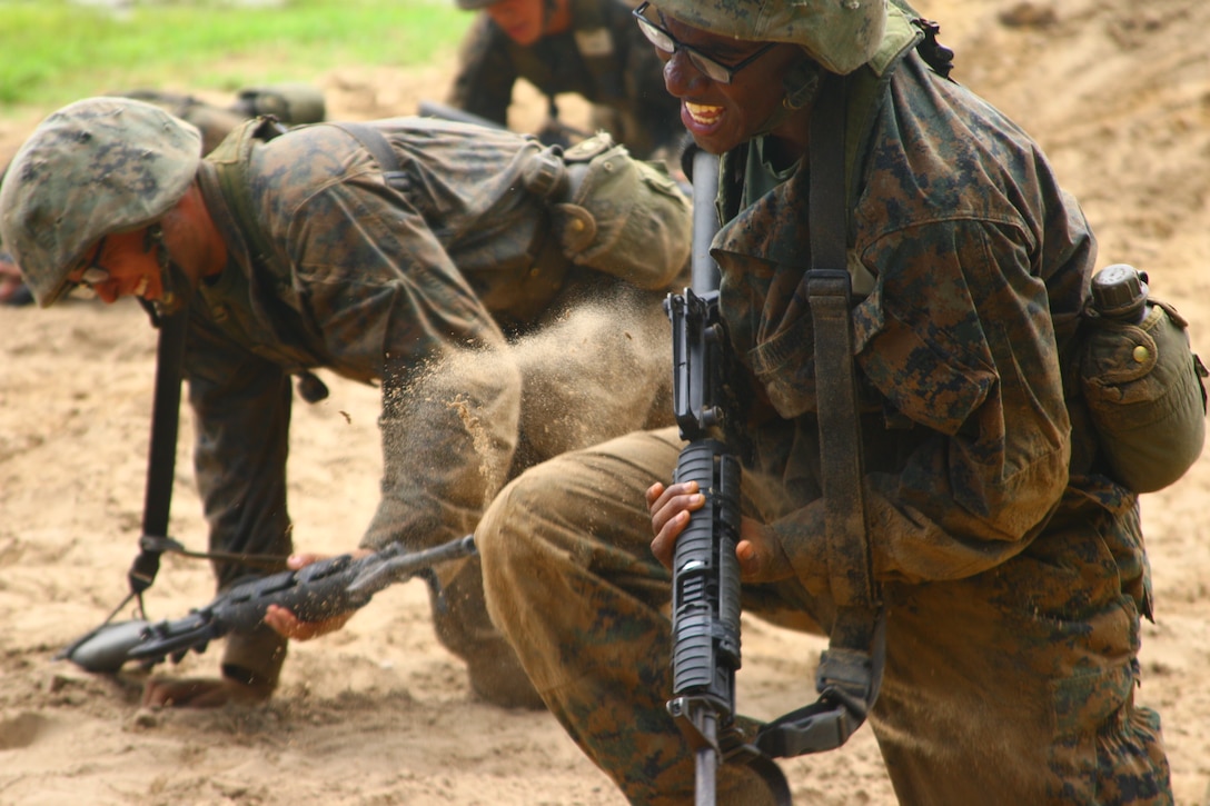 Rct. Andrew K. Comrie, Platoon 1060, Bravo Company, 1st Recruit Training Battalion, steps up to run ahead in the movement course at Page Field on Parris Island, S.C., on Aug. 17, 2012. Comrie graduated Aug. 24, 2012.

