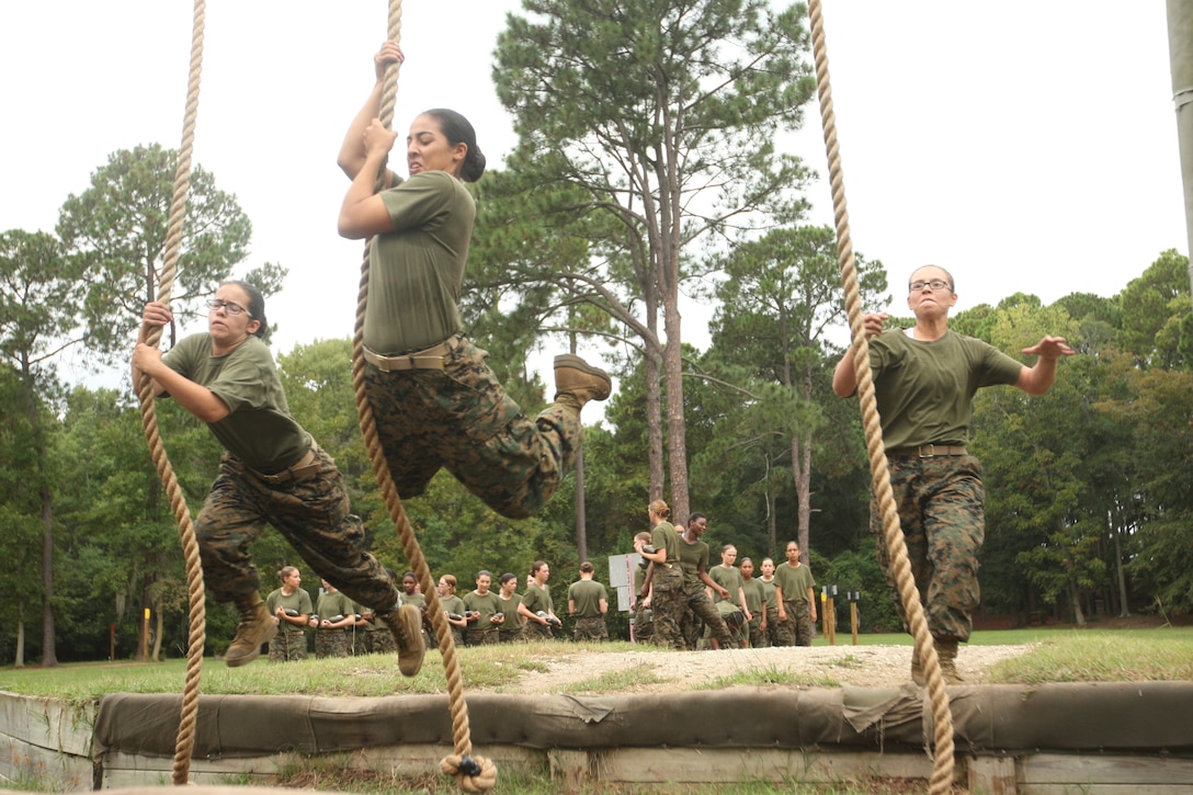 Recruits of November Company, 4th Recruit Training Battalion, do the “Run-Jump-Swing” on the Confidence Course at Parris Island, S.C., on Oct. 3, 2012. November Company is scheduled to graduate Dec. 7, 2012.