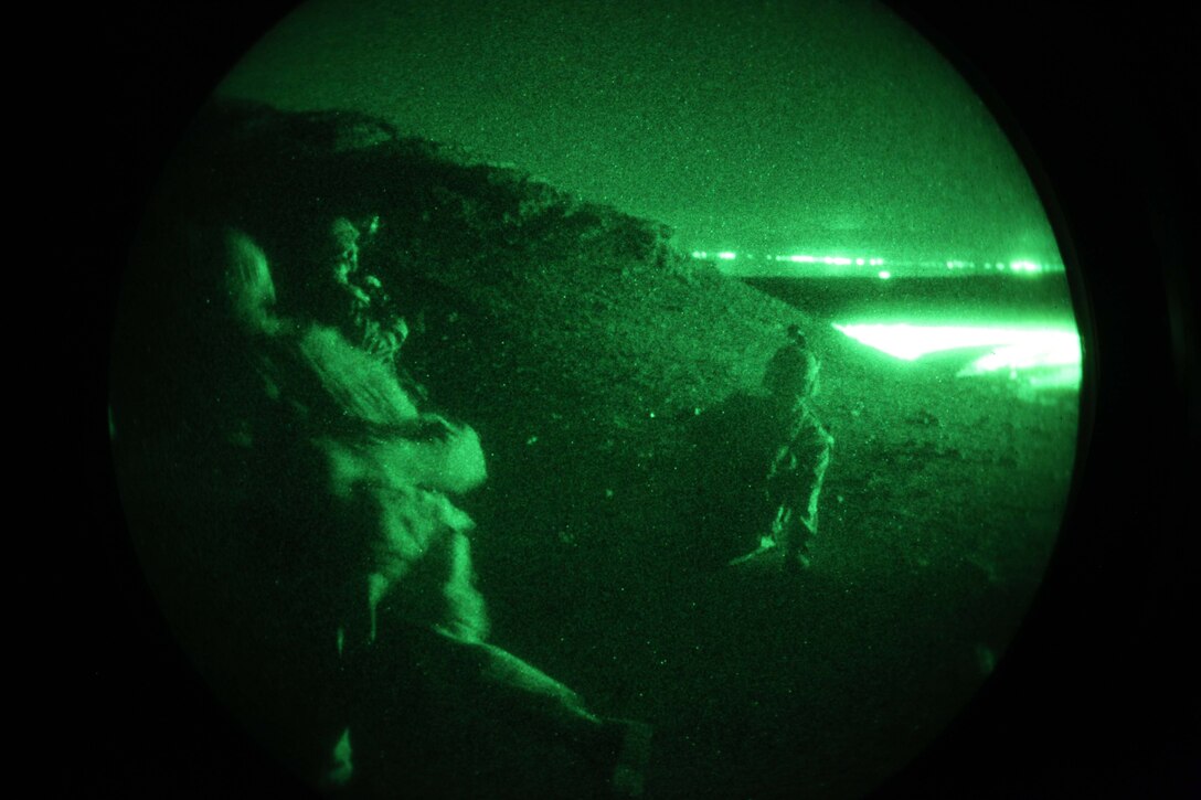 JORDAN (Oct. 10, 2012) U.S. Marines assigned to Marine Engagement Team from Battalion Landing Team 1st Battalion, 2nd Marine Regiment, 24th Marine Expeditionary Unit, conduct a night patrol while participating in a training exercise in Jordan, Oct. 10, 2012. The engagement team is a platoon-sized group of Marines from the 24th MEU who are conducting a variety of unilateral and bilateral training events with the Jordanian Marines in southern Jordan. The 24th MEU is deployed with the Iwo Jima Amphibious Ready Group as a U.S. Central Command theater reserve force, providing support for maritime security operations and theater security cooperation efforts in the U.S. 5th Fleet area of responsibility. (U.S. Marine Corps photo by Lance Cpl. Tucker S. Wolf/Released)