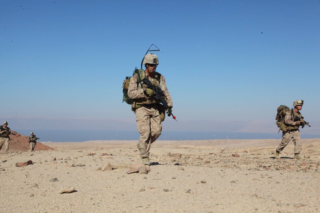 JORDAN (Oct. 9, 2012) U.S. Marines assigned to Marine Engagement Team from Battalion Landing Team 1st Battalion, 2nd Marine Regiment, 24th Marine Expeditionary Unit, conduct a patrol while participating in a training exercise in Jordan, Oct. 9, 2012. The engagement team is a platoon-sized group of Marines from the 24th MEU who are conducting a variety of unilateral and bilateral training events with the Jordanian Marines in southern Jordan. The 24th MEU is deployed with the Iwo Jima Amphibious Ready Group as a U.S. Central Command theater reserve force, providing support for maritime security operations and theater security cooperation efforts in the U.S. 5th Fleet area of responsibility. (U.S. Marine Corps photo by Lance Cpl. Tucker S. Wolf/Released) 