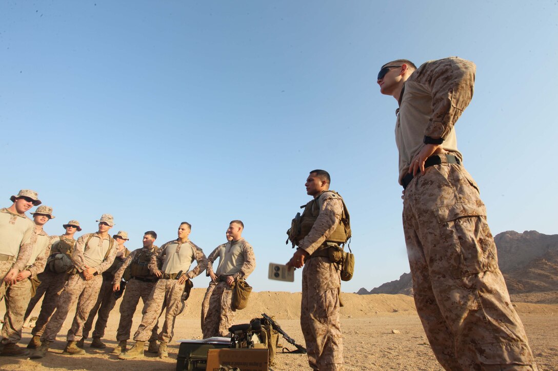 JORDAN (Oct. 3, 2012) U.S. Marines assigned to Marine Engagement Team from 24th Marine Expeditionary Unit, receive a safety brief prior to conducting a live-fire training exercise, Oct. 3, 2012. The engagement team is a platoon-sized group of Marines from the 24th MEU who are conducting a variety of unilateral and bilateral training events with the Jordanian Marines in southern Jordan. The 24th MEU is deployed with the Iwo Jima Amphibious Ready Group as a U.S. Central Command theater reserve force, providing support for maritime security operations and theater security cooperation efforts in the U.S. 5th Fleet area of responsibility. (U.S. Marine Corps photo by Lance Cpl. Tucker S. Wolf/Released)
