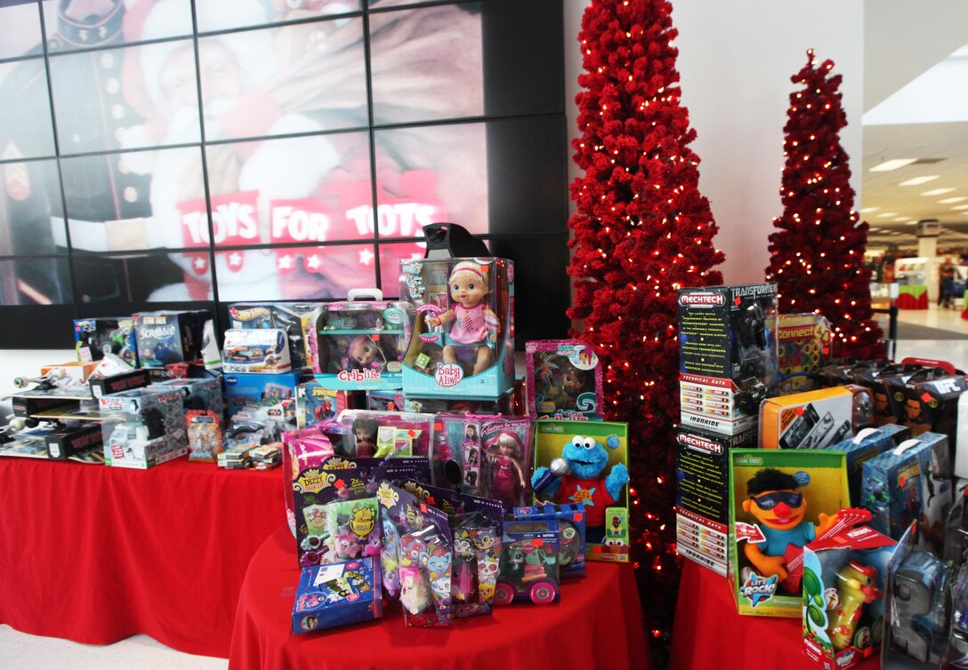 The Marine Corps Reserve Toys for Tots program recently kicked off the start of toy collections at the Marine Corps Exchange aboard Marine Corps Base Camp Lejeune Nov. 1. Purchased toys were stacked on the tables at the exchange entrance.