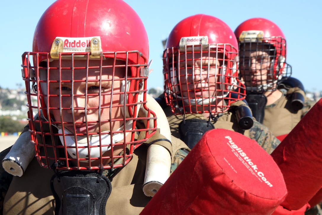 Recruits of Company I, 3rd Recruit Training Battalion, wait their turn to face one another in pugil stick bouts aboard Marine Corps Recruit Depot San Diego, Oct. 29. Recruits were faced with various scenarios that included facing multiple opponents. Each pigil stick bout ending when a recruit was hit on the head and each fight lasted approximatley 15 seconds.