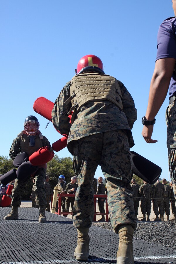 Recruits of Company I, 3rd Recruit Training Battalion, face off against one another in a pugil stick bout aboard Marine Corps Recruit Depot San Diego, Oct. 29. Recruits were matched up according to weight. Prior to the pugil stick fights recruits were taught blocks and strikes. 