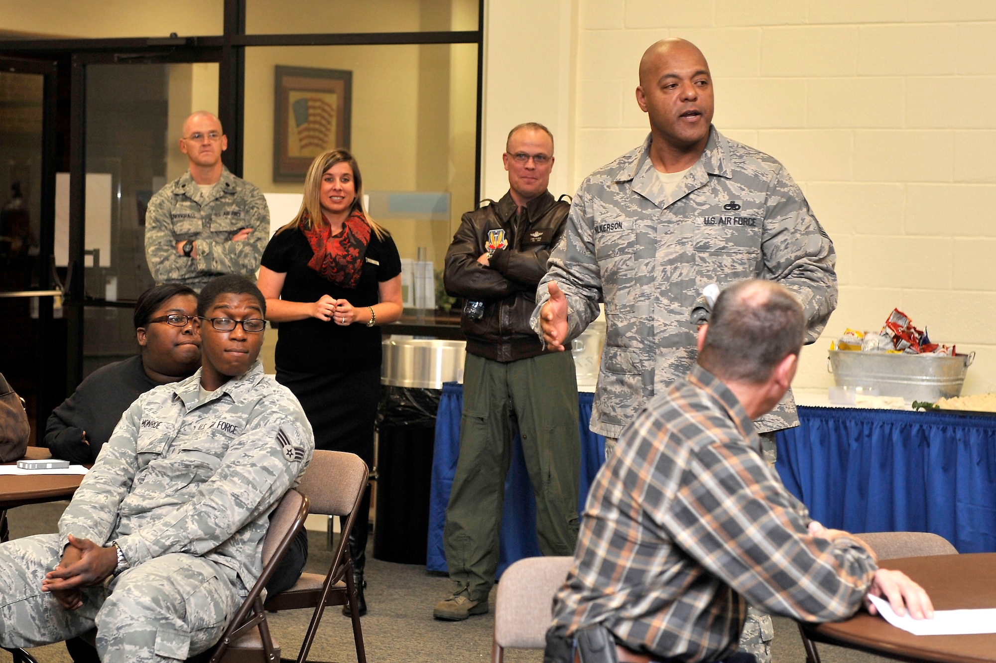 Chief Master Sgt. James Wilkerson, Command Chief, 20th Fighter Wing, Shaw Air Force Base, thanks all community members for attending the town hall and reassures Wing Leaderships’ regard for base housing, as previously stated by Col. Lance Kildron, Vice Commander, 20th Fighter Wing, Shaw AFB during his opening remarks Oct. 30, 2012, Shaw AFB, S.C.. The town hall is an open forum, held quarterly, where residents have a chance to voice any concerns about their homes and phasing plans. (U.S. Air Force photo by Staff Sgt. Ave I. Young/Released)