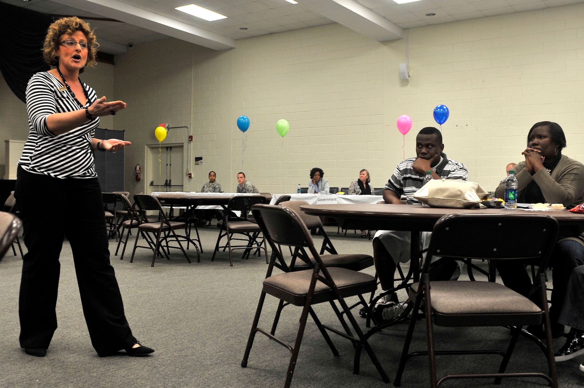 Jamie Miller, General Manager, Southern Group, Forest City Military Community explains how billing is decided after trial periods, to make it fair for all military housing occupants Oct. 30, 2012, Shaw Air Force Base, S.C. The town hall is an open forum, held quarterly, where residents have a chance to voice any concerns about their homes and phasing plans. (U.S. Air Force photo by Staff Sgt. Ave I. Young/Released)