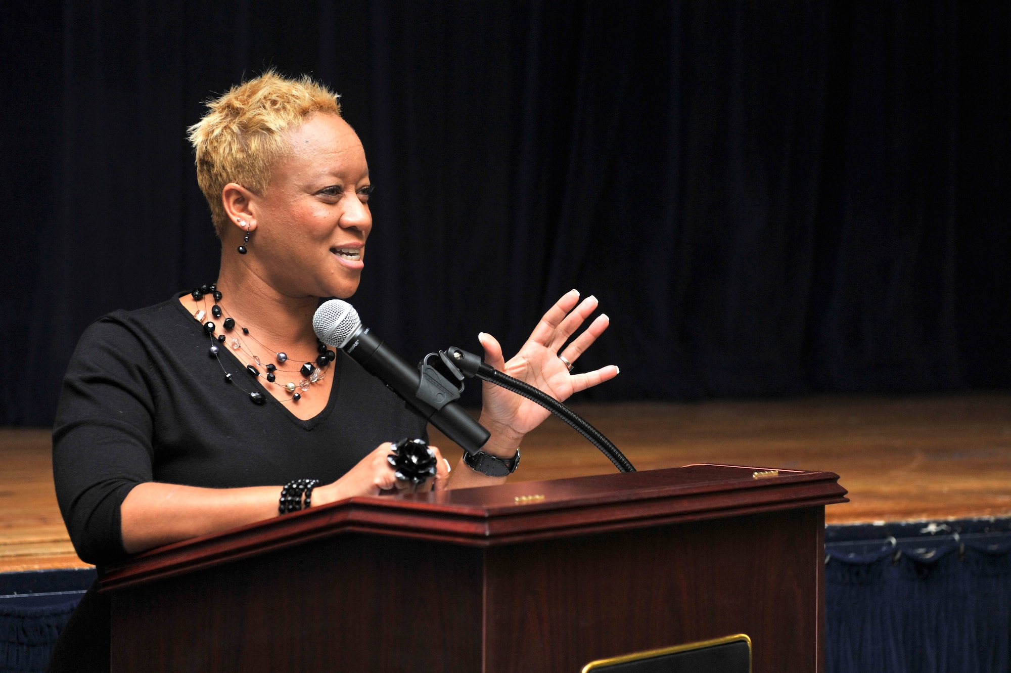 Leslie Birth, Community Manager Forest City, Military Community, Shaw Air Force Base welcomes all housing residents in attendance to the Forest City Town Hall, Oct. 30, 2012, S.C. The town hall is an open forum, held quarterly, where residents have a chance to voice any concerns about their homes and phasing plans.  (U.S. Air Force photo by Staff Sgt. Ave I. Young/Released)