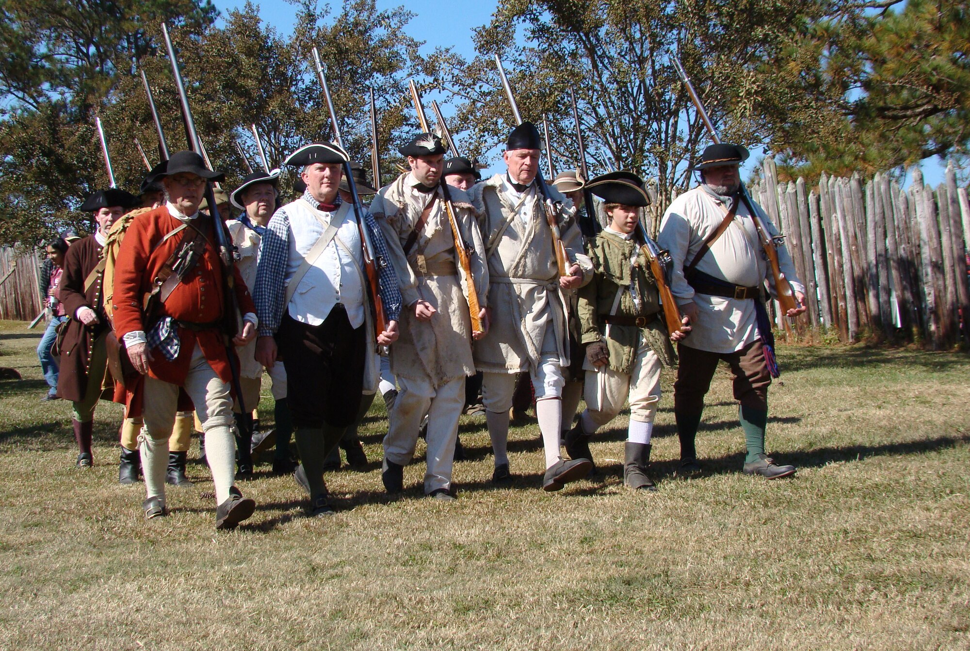 Marching toward the battle, re-enactors portray colonial militiamen of the American War of Independence, about 25 miles north of Shaw Air Force Base, at Camden, S.C., Nov. 3, 2012. Camden was the site of the Continental Army’s worst defeat on Aug. 16, 1780. More than 200 re-enactors, including many military veterans, brought the battlefield back to life 232 years after the event. (U.S. Air Force photo by Rob Sexton/Released)