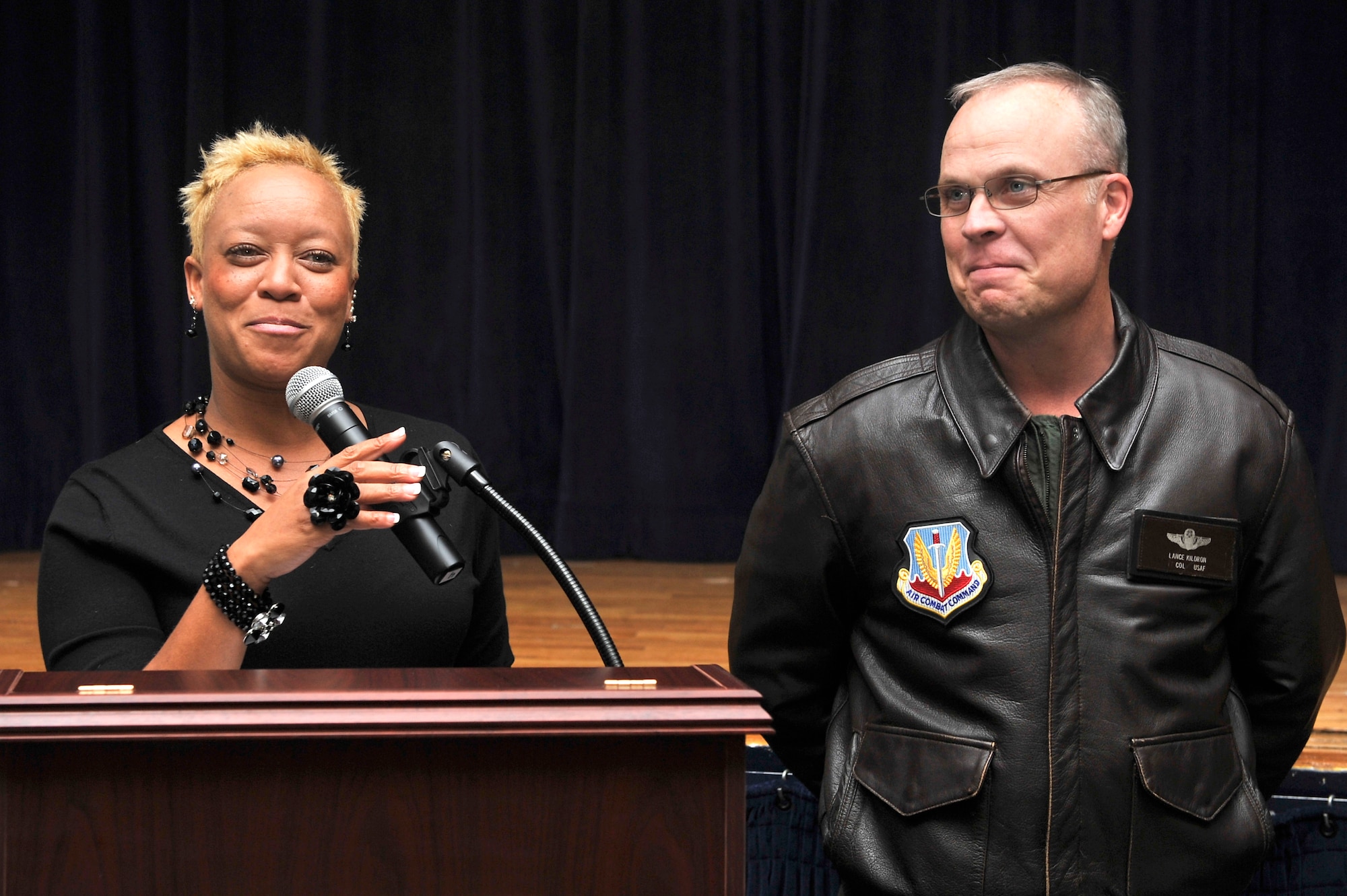 Leslie Birth, Community Manager Forest City, Military Community, Shaw Air Force Base, introduces Col. Lance Kildron, Vice Commander, 20th Fighter Wing, Shaw AFB to open the Forest City Town Hall, held inside the Base Community Center, Oct. 30, 2012, S.C. The town hall is an open forum, held quarterly, where residents have a chance to voice any concerns about their homes and phasing plans.  (U.S. Air Force photo by Staff Sgt. Ave I. Young/Released) 