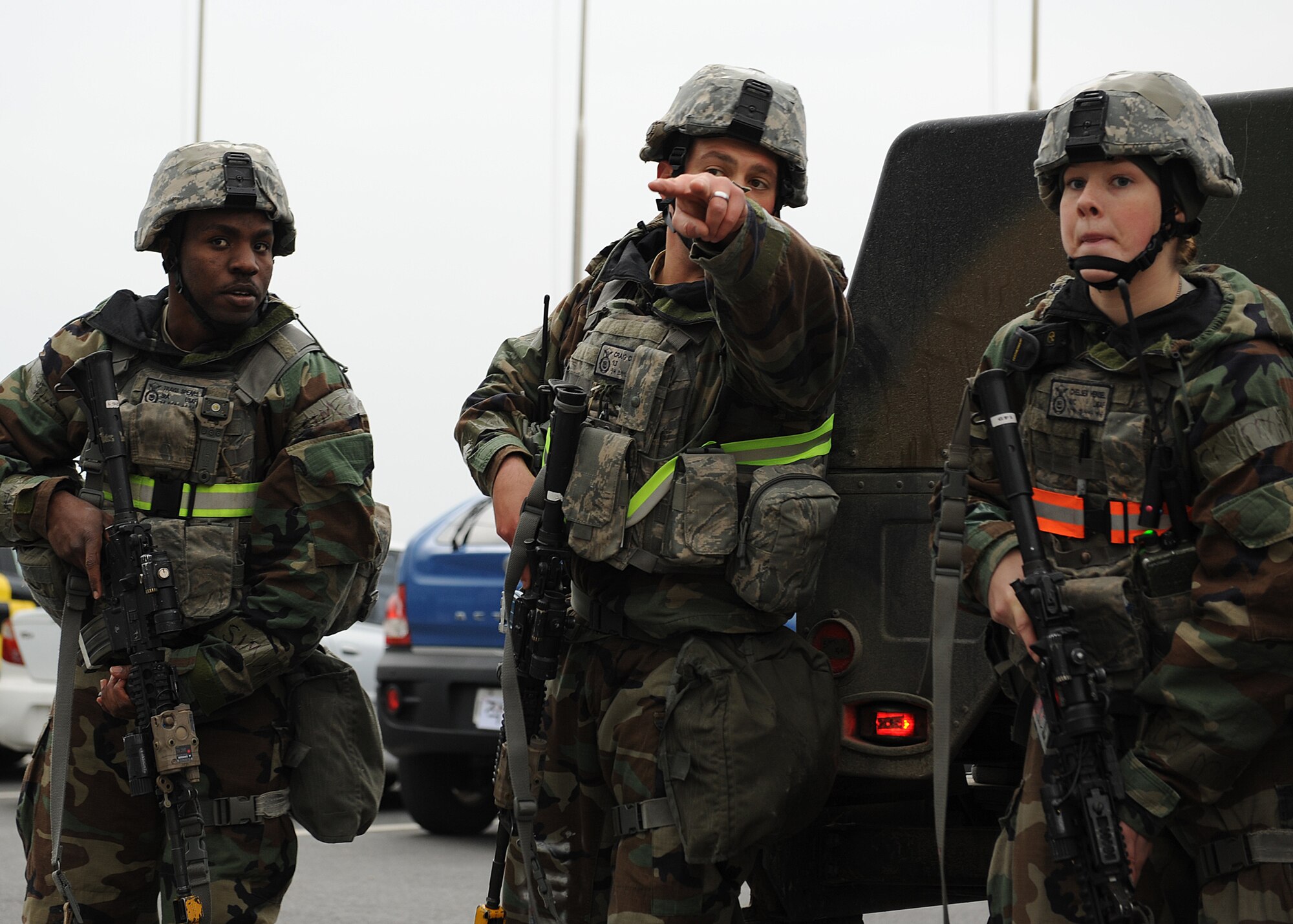 1st Lieutenant Craig Cupo (center) gives instructions to Senior Airman Travis Spears and Airman 1st Class Chelsea Hensel during a simulated ground attack on Kunsan Air Base, Republic of Korea, Nov. 6, 2012. This was part of exercise Beverly Bulldog 13-1 which assesses the base’s combat and mission readiness. Cupo, Spears and Hensel are part of the 8th Security Forces Squadron (U.S. Air Force photo/Staff Sgt. Jonathan Fowler)