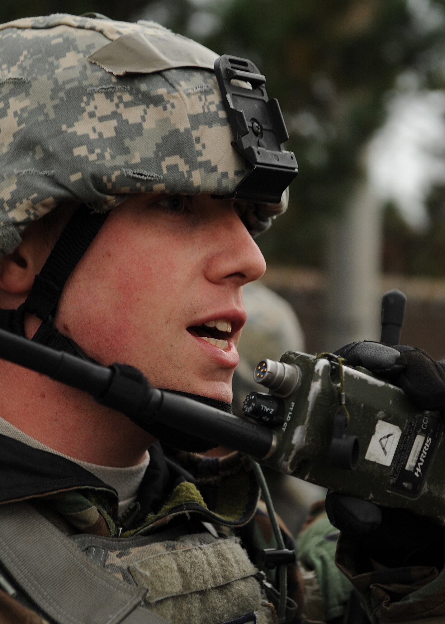 Staff Sgt. Jake Harris, 8th Security Forces Squadron, calls in information during a simulated ground attack during Beverly Bulldog 13-1 on Kunsan Air Base, Republic of Korea, Nov. 6, 2012. The exercise featured US and ROK air forces responding to various simulated scenarios such as ground and missile attacks. (U.S. Air Force photo/Staff Sgt. Jonathan Fowler)