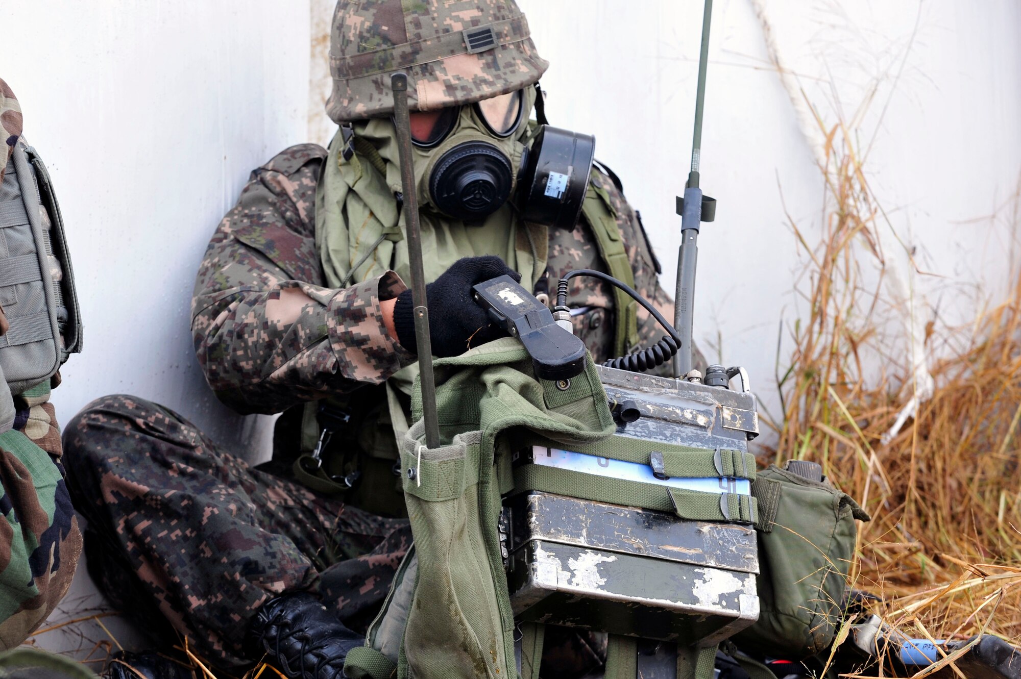A Republic of Korea Army 4th Battalion 51st Division soldier reports his unit’s accountability during a ground attack during operational readiness exercise Beverly Bulldog 13-01 at Osan Air Base, Republic of Korea, Nov. 6, 2012. This marks the first time ROK Army has participated in this kind of U.S. Air Force exercise at Osan. (U.S. Air Force photo/Airman 1st Class Alexis Siekert)