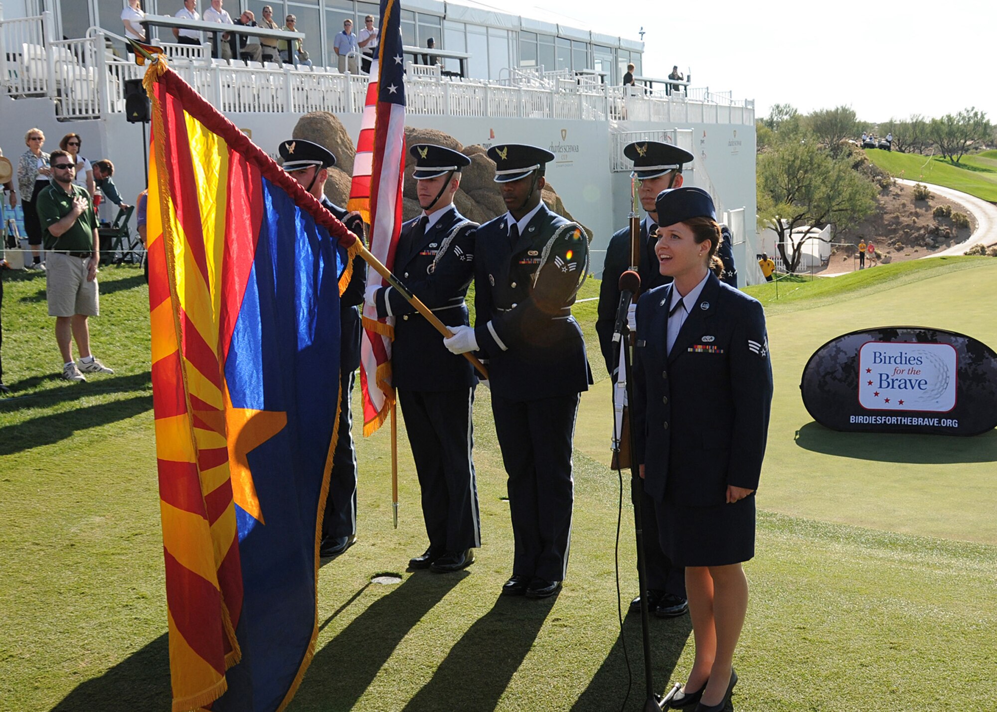 Senior Airman Melinda Charlton and the Luke Air Force Base Honor Guard open up Military Appreciation Day with the Star Spangled Banner and presentation of the Colors for the Charles Schwab Cup Championship Saturday, Nov. 3rd in Scottsdale, Ariz. (U.S. Air Force Photo by Staff Sgt. Josh Nason) 