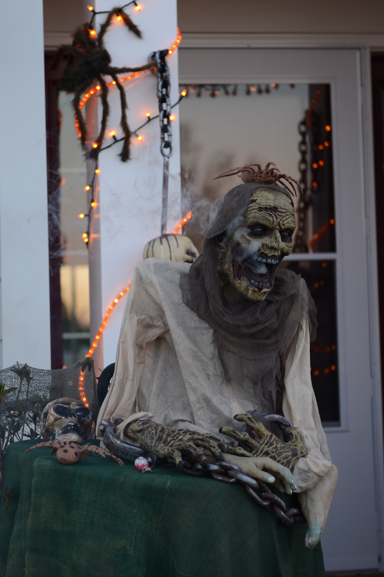 This animatronic-zombie was used to decorate one of the base houses at Shaw Air Force Base, S.C., Oct. 31. The zombie would rotate its head and spew fog, frightening some of the little children. (U.S. Air Force photo by Airman 1st Class Krystal M. Jeffers/Released)