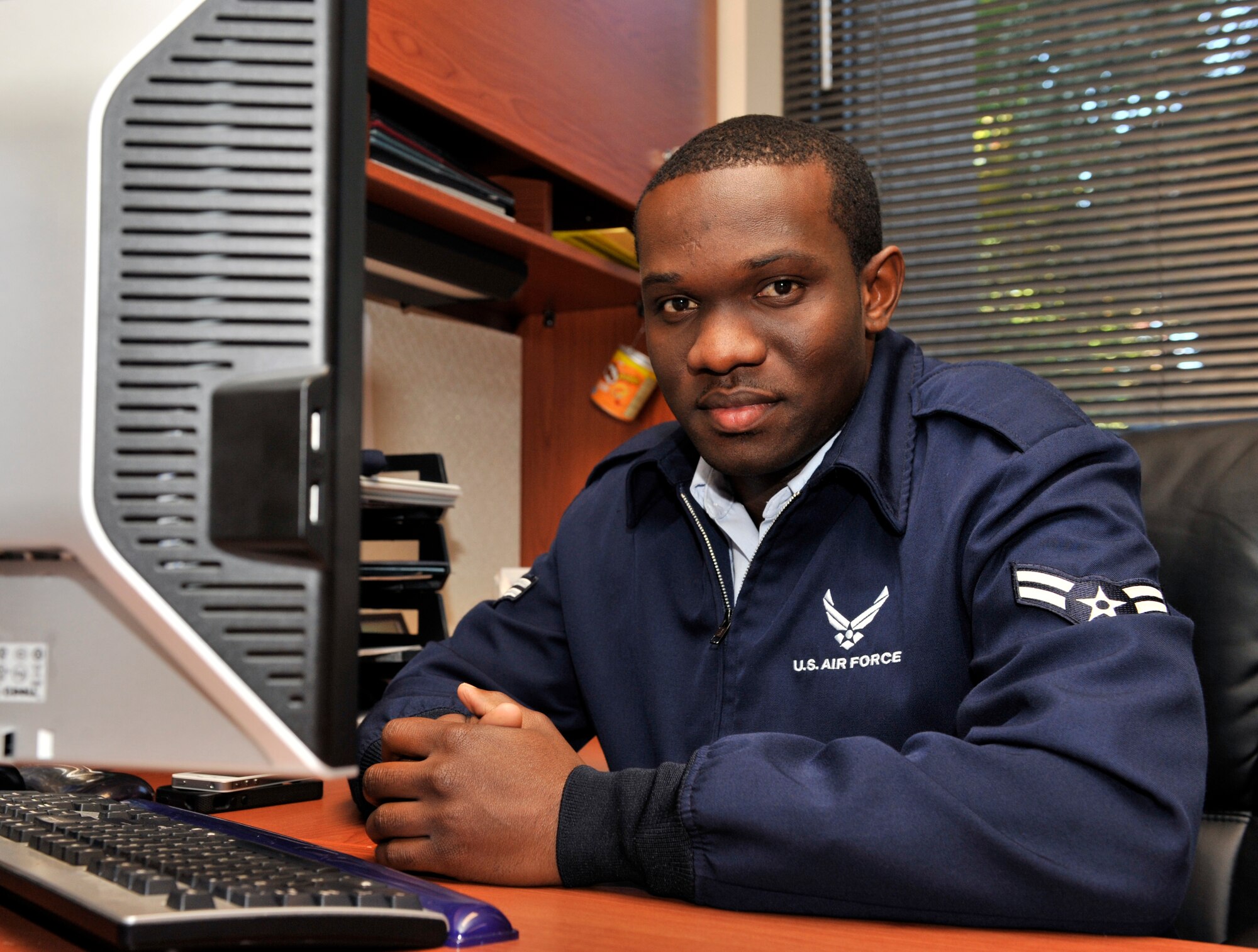 U.S. Air Force Airman 1st Class Cliffeton Lawrence, 20th Fighter Wing Knowledge Operations Management knowledge operations journeyman, poses for a photo for the Shaw News Spotlight, Shaw Air Force Base, S.C., Oct.22, 2012. Lawrence is the spotlight for the week of Oct. 22 through 26. (U.S. Air Force photo by Senior Airman Amber E. N. Jacobs/ Released)