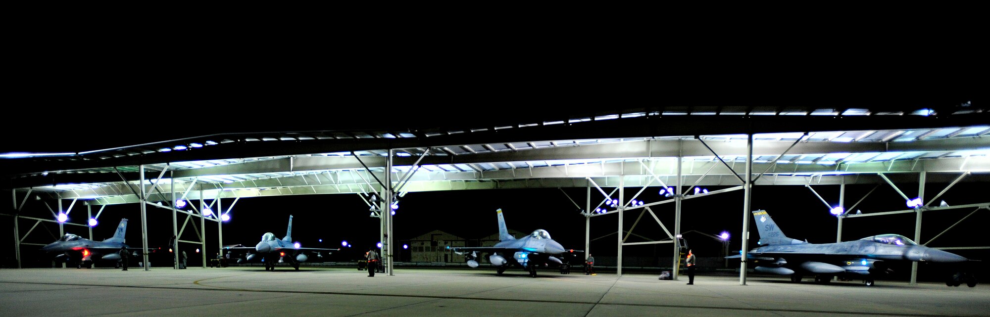 Four U.S. Air Force F-16 Fighting Falcon jets are postured for take-off, Oct. 10, 2012, Shaw Air Force Base, S.C. Several Team Shaw Airmen and F-16 fighter pilots from the 77th Fighter Squadron deployed from Shaw to an undisclosed location in Southwest Asia. (U.S. Air Force photo by Staff Sgt. Kenny Holston/Released)    