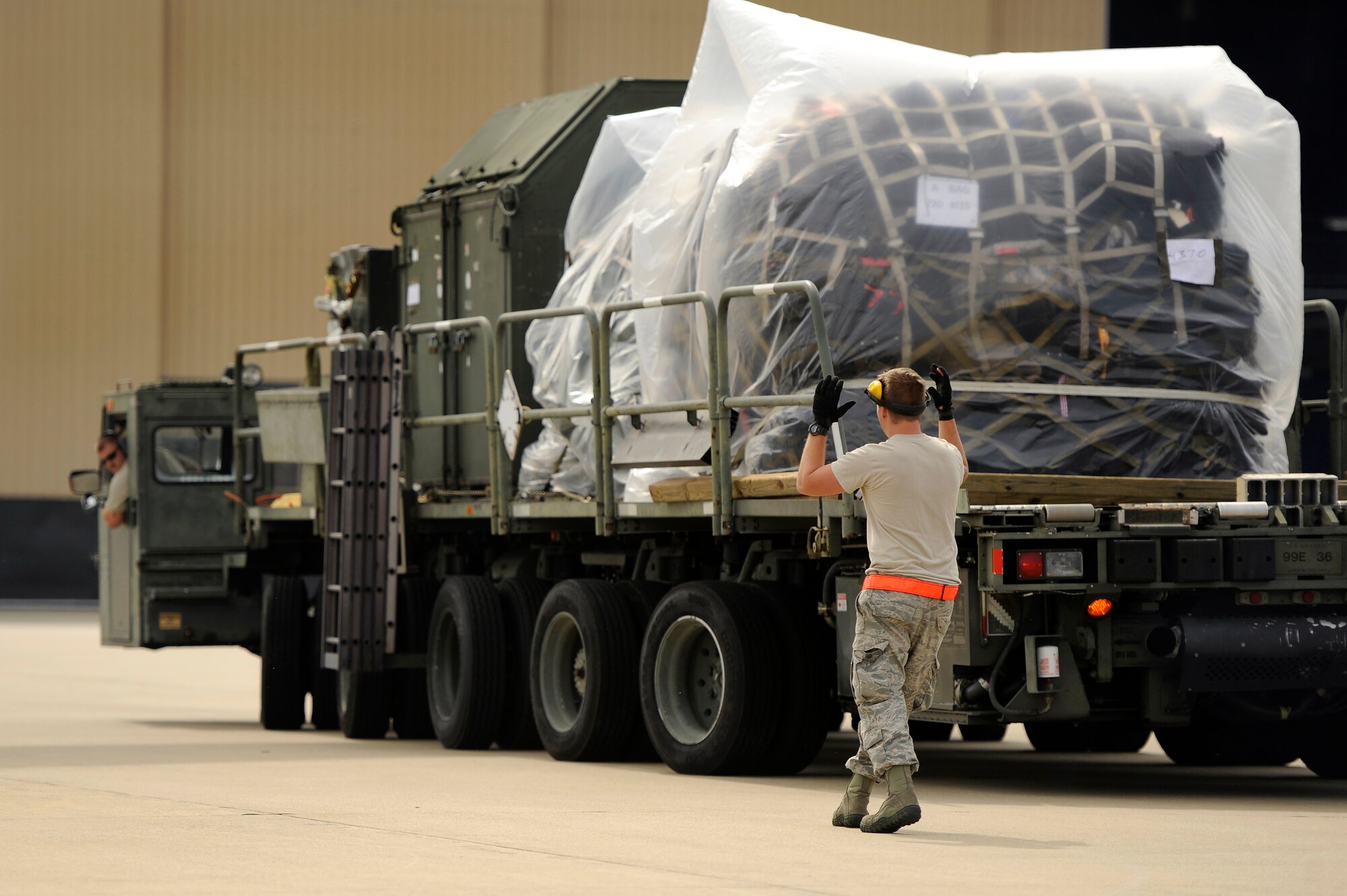 U.S. Air Force Airmen assigned to the 20th Logistics Readiness Squadron load Aerospace Ground Equipment and other cargo on to a C-17 Globemaster III in support of an upcoming deployment, Oct. 5, 2012, Shaw Air Force Base, S.C. Several Team Shaw Airmen and F-16 fighter pilots from the 77th Fighter Squadron deployed from Shaw to an undisclosed location in Southwest Asia. (U.S. Air Force photo by Staff Sgt. Kenny Holston/Released)