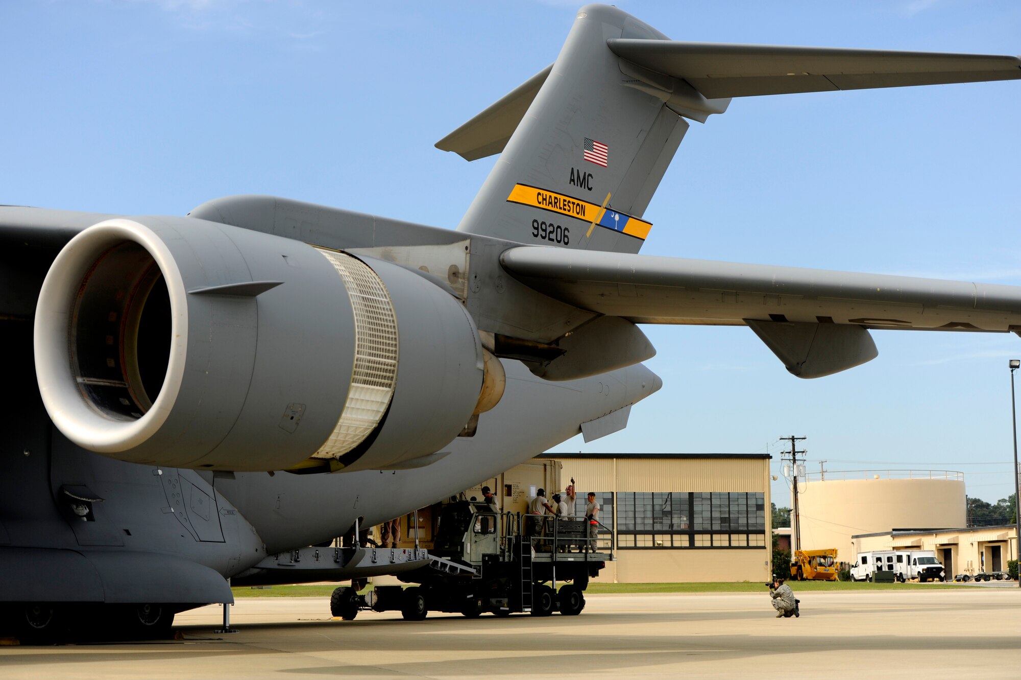 U.S. Air Force Airmen assigned to the 20th Logistics Readiness Squadron and C-17 crew chiefs load cargo on to a C-17 Globemaster III in support of an upcoming deployment, Oct. 5, 2012, Shaw Air Force Base, S.C. Several Team Shaw Airmen and F-16 fighter pilots from the 77th Fighter Squadron deployed from Shaw to an undisclosed location in Southwest Asia. (U.S. Air Force photo by Staff Sgt. Kenny Holston/Released)
