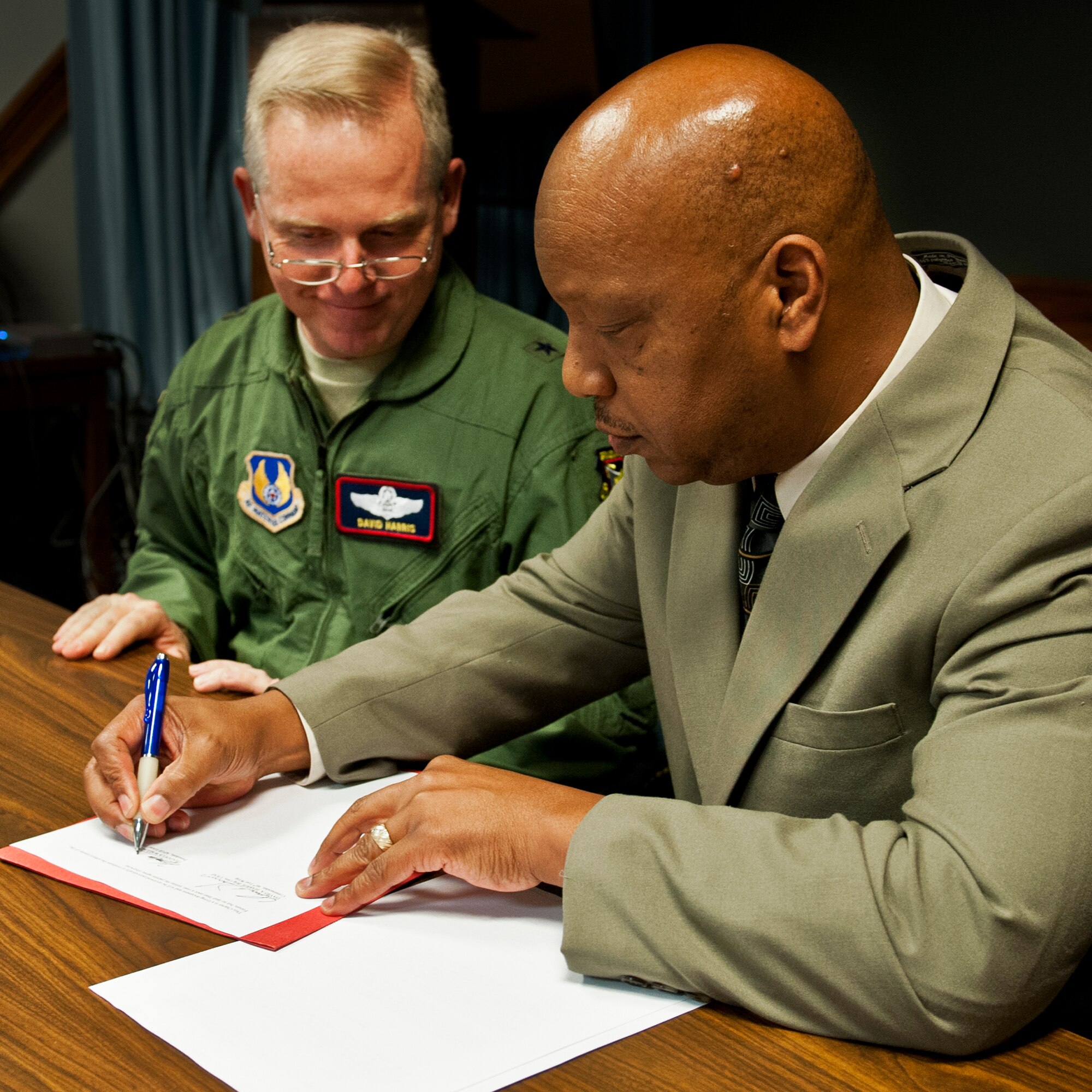 Brig. Gen. David Harris, the 96th Test Wing commander and Thaddeus Wallace, the president of American Federation of Government Employees, Local 1897 signed an agreement to establish a labor-management forum Nov. 6 at Eglin Air Force Base, Fla.  The goal of the forum is to create a high performance work environment that addresses future challenges while fostering a high quality-of-work life for employees.  (U.S. Air Force photo/Randy Gon)

